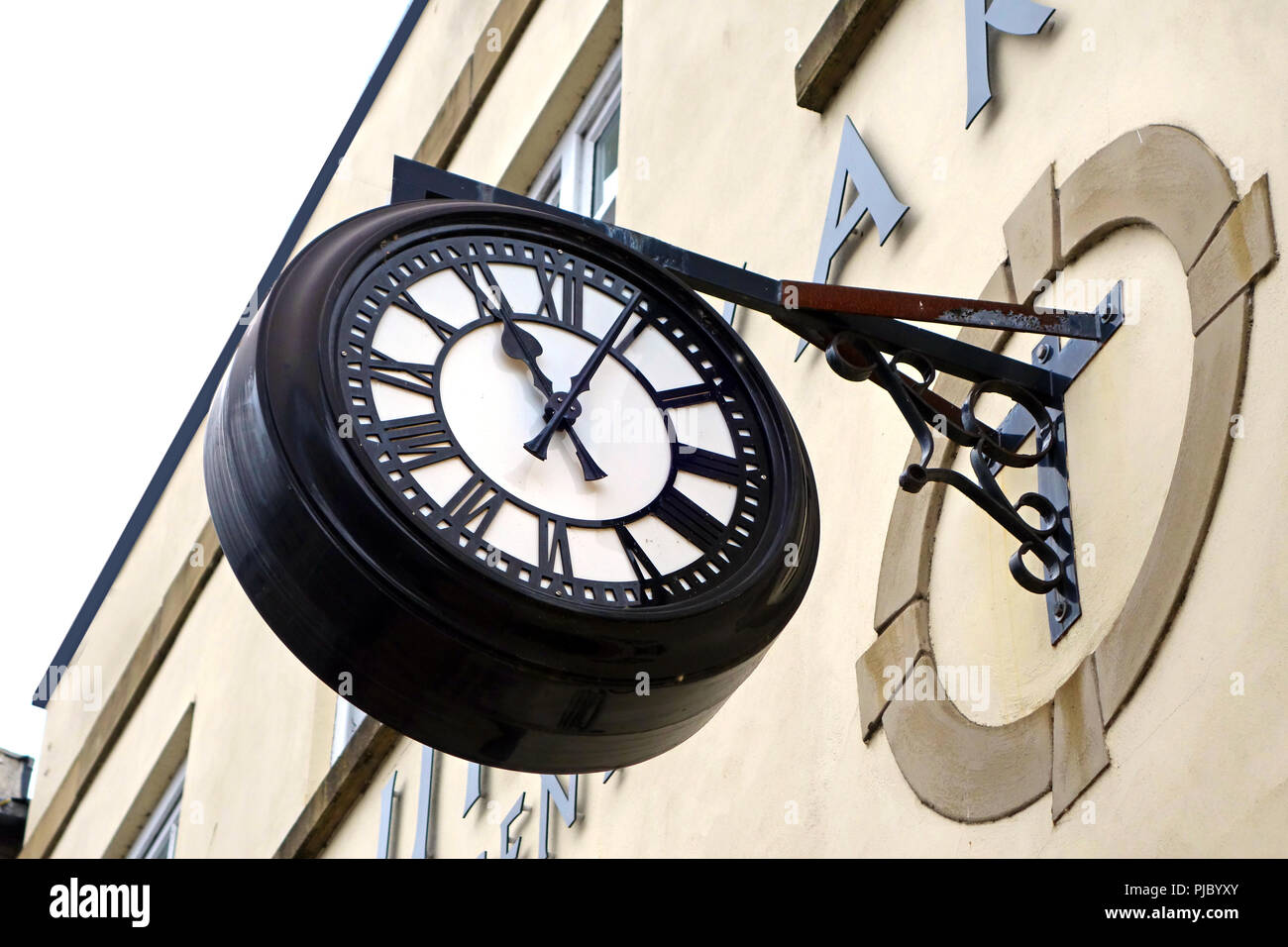 Large exterior bracket clock Stock Photo