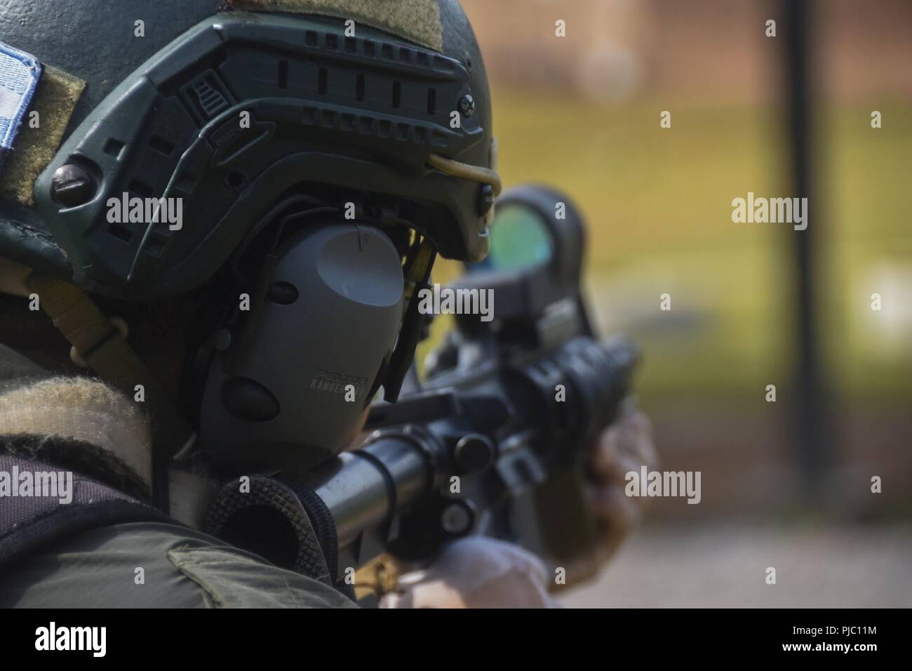 An Argentinian comando shoots targets during a stress shoot event ...