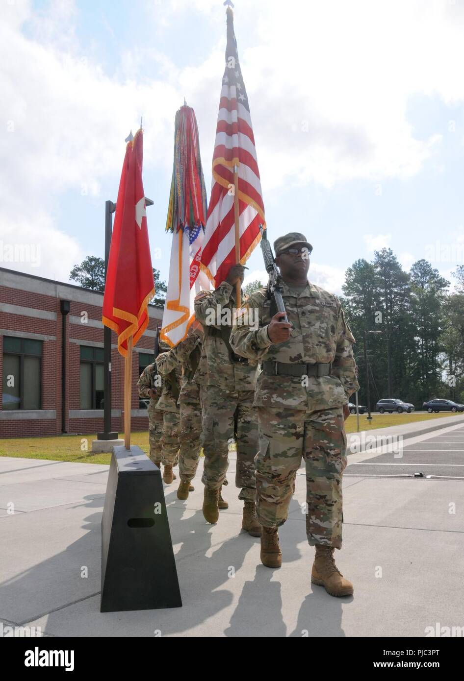 Soldiers of the Fort Lee Color Guard post the Colors during a ribbon 