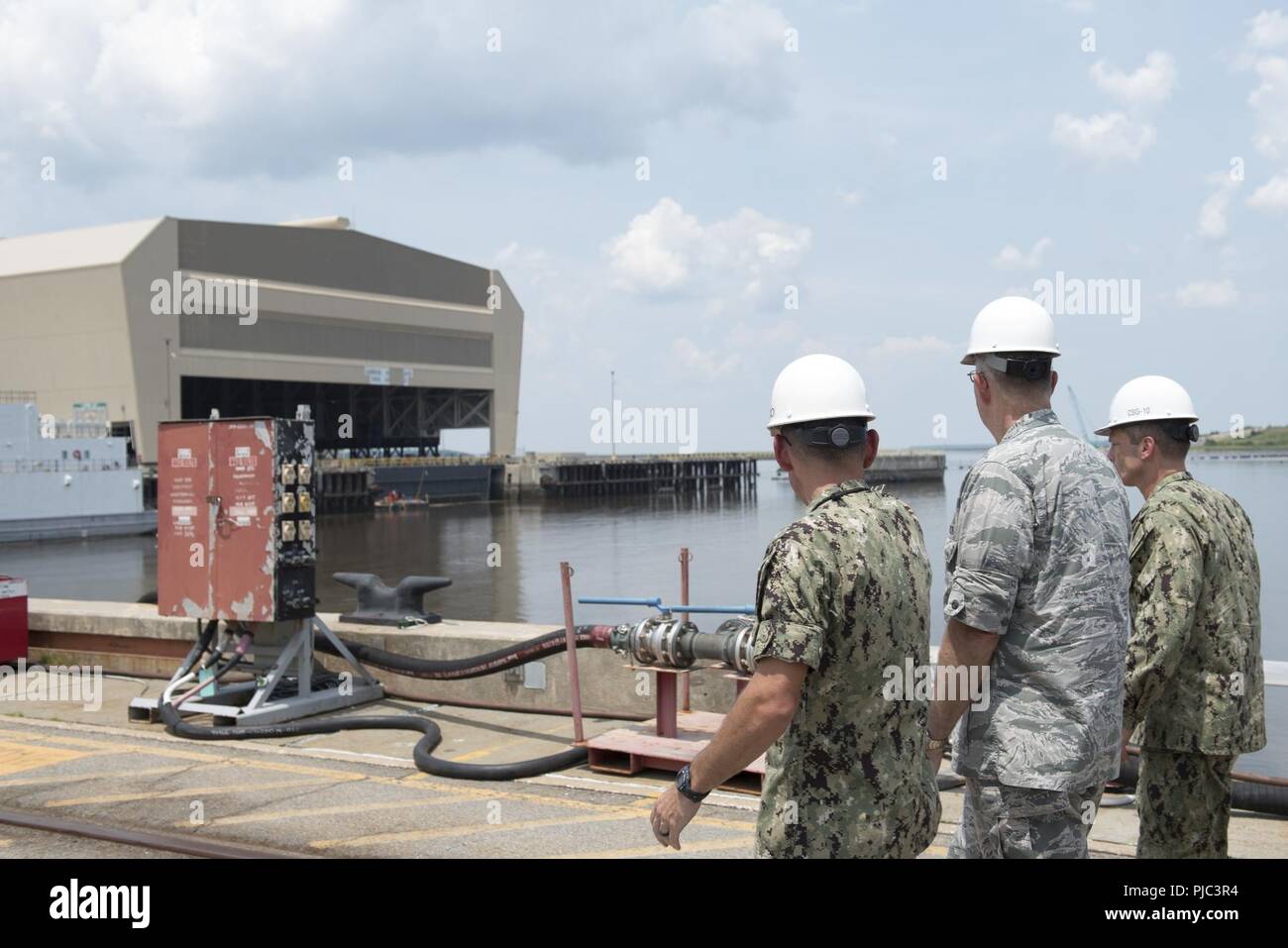 Gen. John E. Hyten, commander, U.S. Strategic Command (USSTRATCOM), views the dry dock at Naval Submarine Base Kings Bay, Ga. The base is home to six of the Ohio-class ballistic missile submarines that make up the most survivable leg of the nuclear triad and support strategic deterrence. Stock Photo