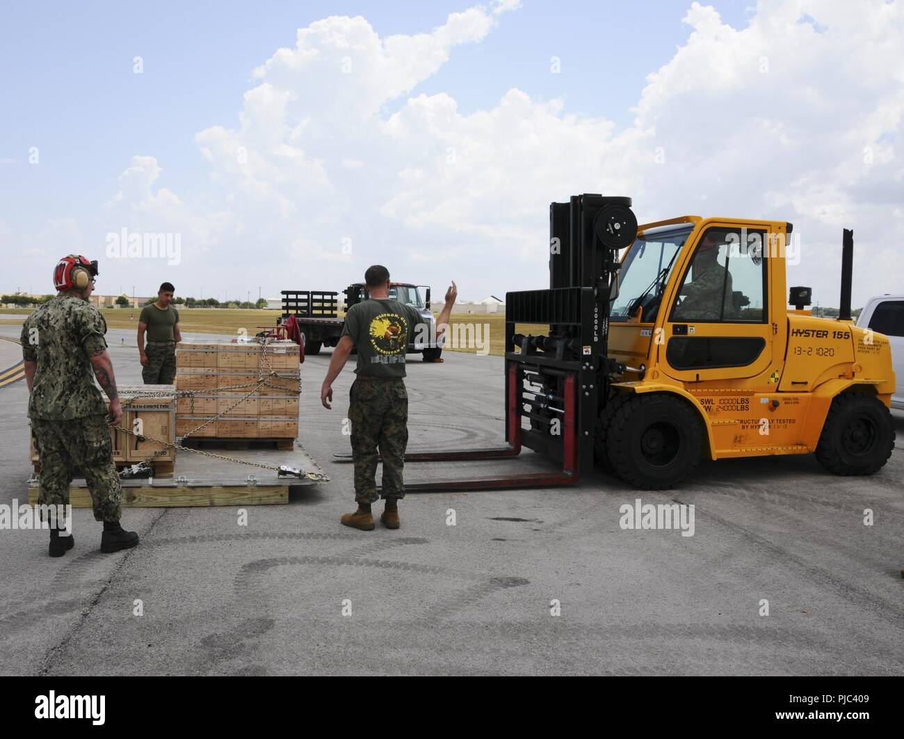 Fort Worth Texas July 12 2018 Staff Sgt Benjamin Reynolds From Marine Forces North Signals Forklift Operator Aviation Ordnanceman 2nd Class Christian Aldana Valdez From Naval Air Station Fort Worth Joint Reserve Base
