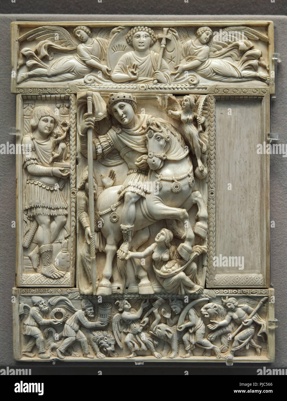 Barberini ivory on display in the Louvre Museum in Paris, France. The Byzantine ivory leaf dated from the first half of the 6th century represents the emperor as triumphant victor, usually identified as Emperor Justinian, or possibly Anastasius I Dicorus or Zeno. Stock Photo
