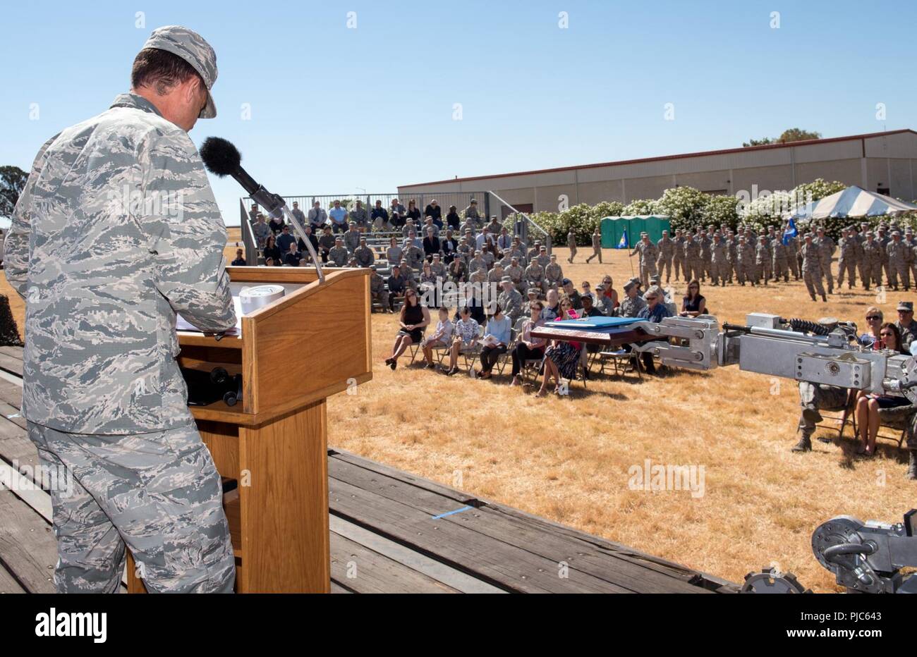 U.S. Air Force Col. Ethan Griffin, 60th Air Mobility Wing commander provides remarks during the 60th Mission Support Group Change of Command ceremony at Travis Air Force Base, Calif., July 16, 2018. Griffin was the presiding officer for the Change of Command Ceremony. Stock Photo