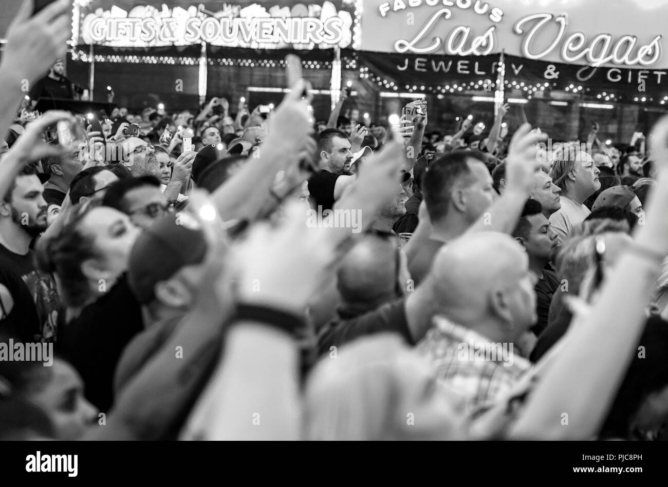 The crowd with phones in the air at the Fremont Street Experience in downtown Las Vegas,Nevada Stock Photo