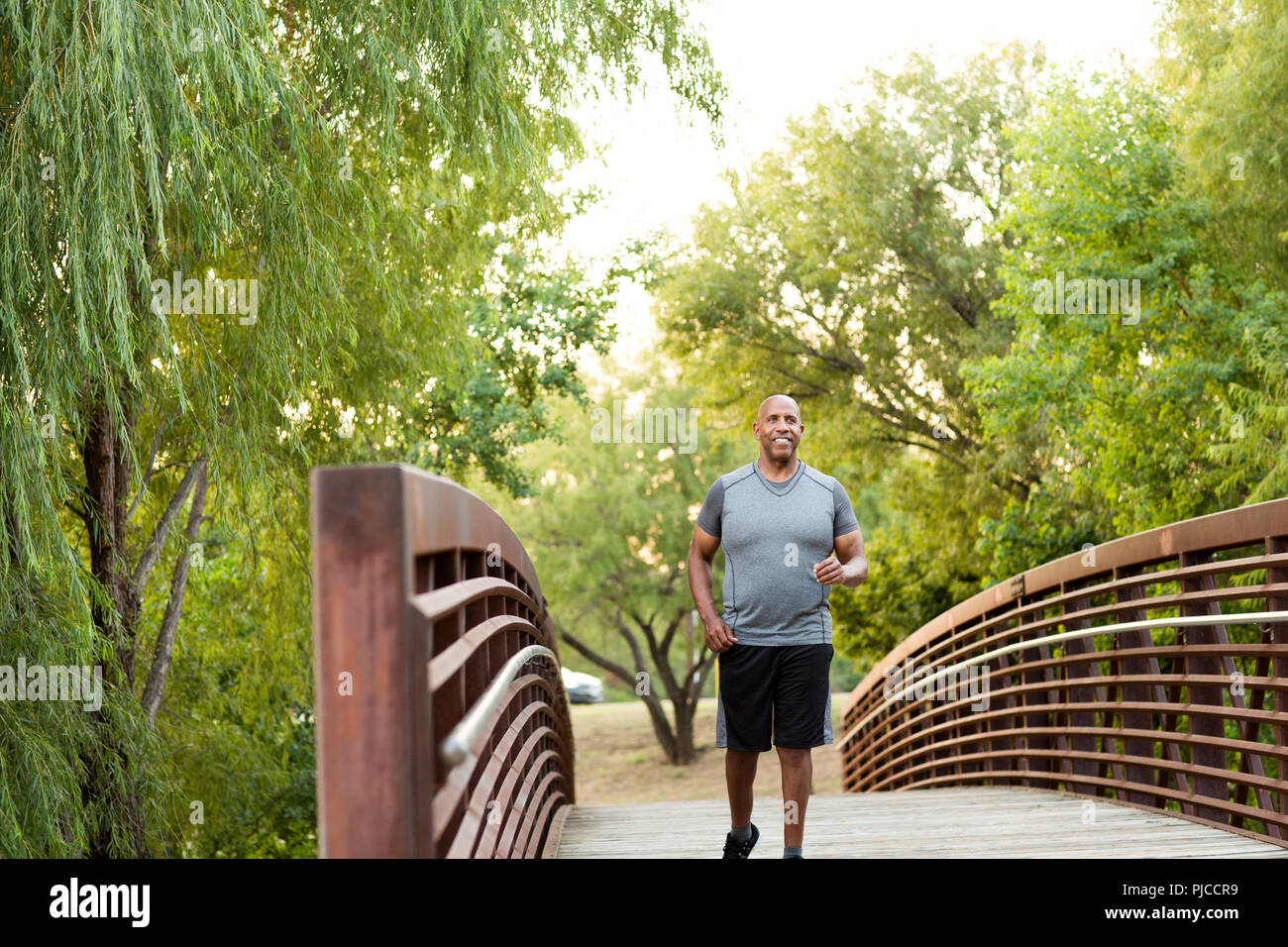 African American man taking a walk in the park. Stock Photo
