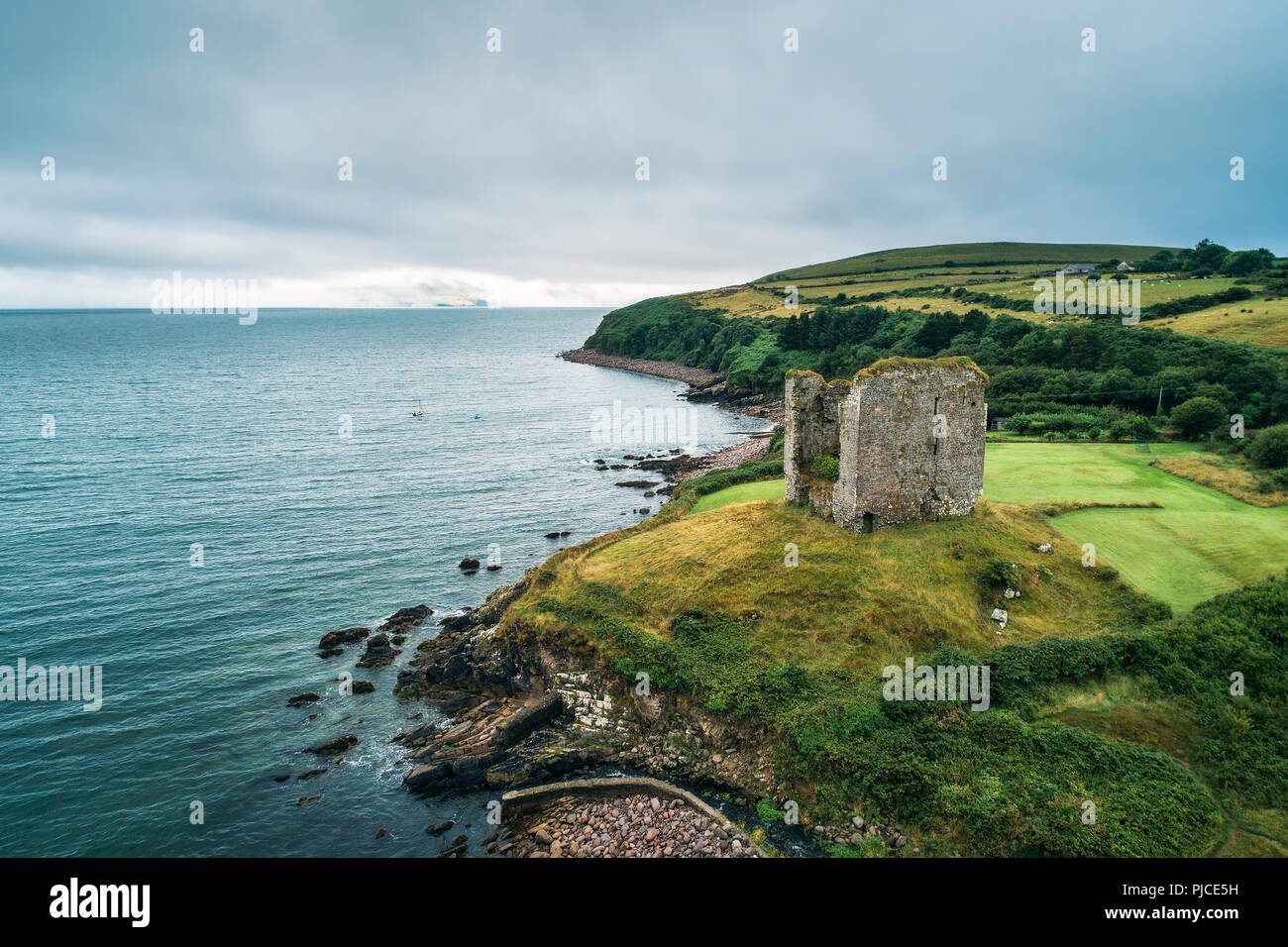 Aerial view of the Minard Castle situated on the Dingle Peninsula in Ireland Stock Photo