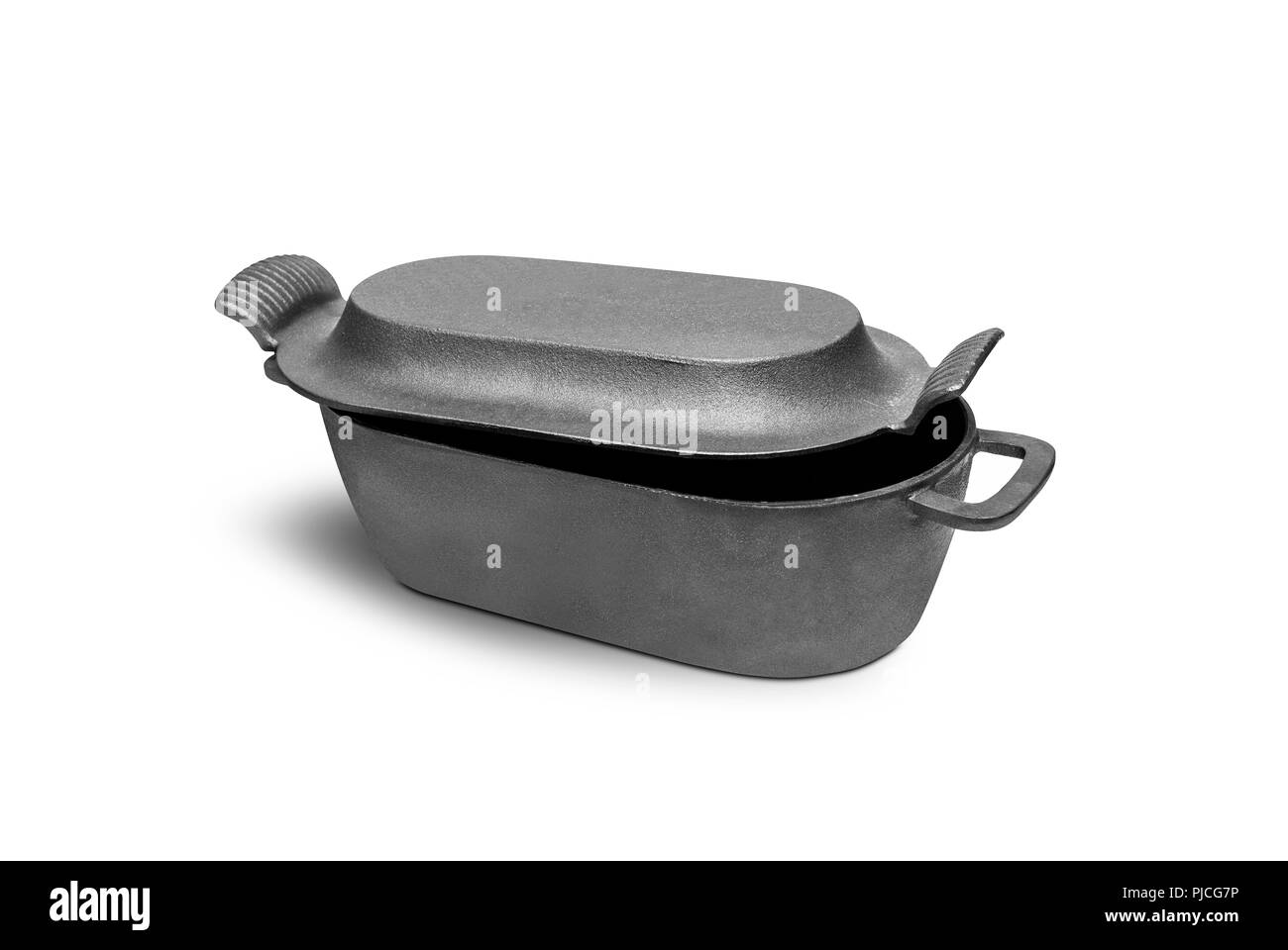 Cast iron pan with lid. Isolated on white background. With clipping