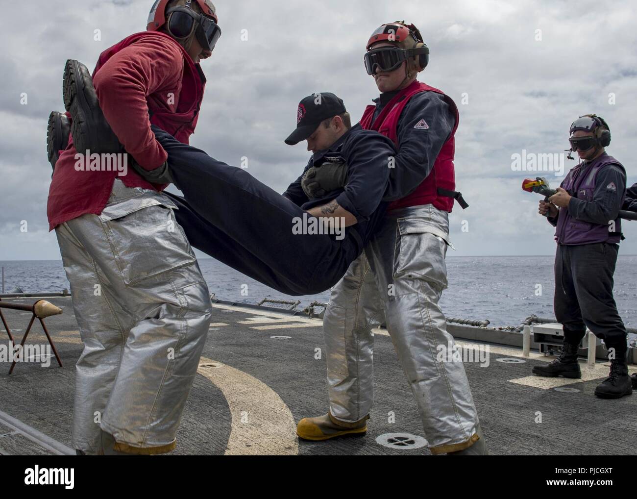 PACIFIC OCEAN (July 21, 2018) Sailors from the crash and salvage team ...