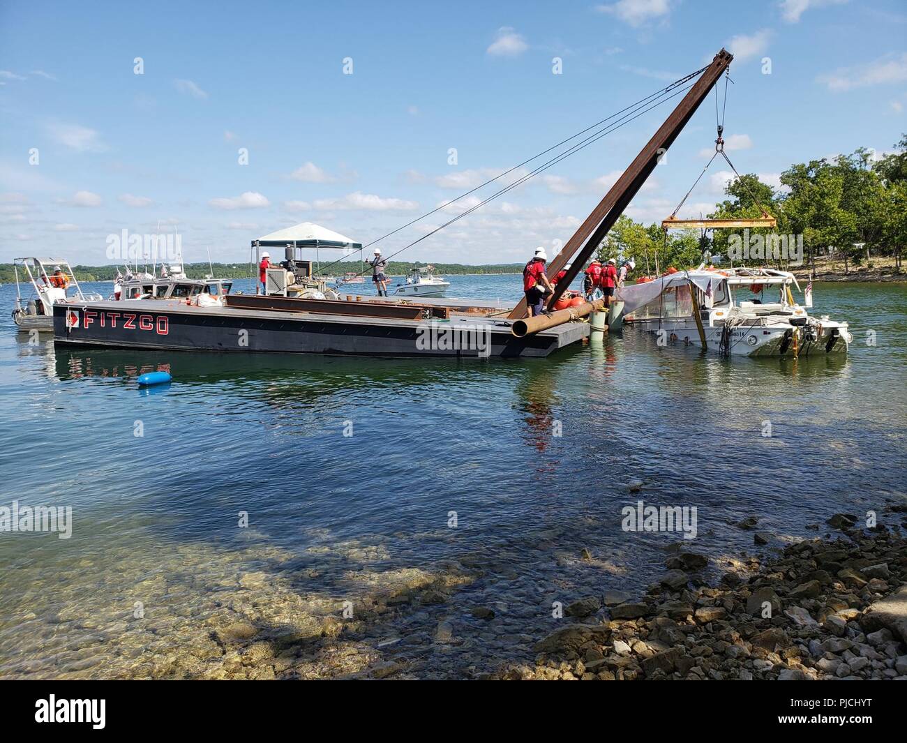 The Coast Guard oversees the removal of Stretch Duck 7 from Table Rock