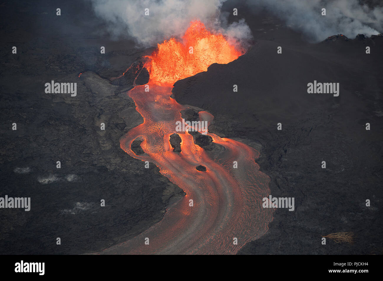 aerial view of lava from Kilauea Volcano, erupting from fissure 8 in Leilani Estates, near Pahoa, sending a river of lava to Kapoho, Hawaii, USA Stock Photo