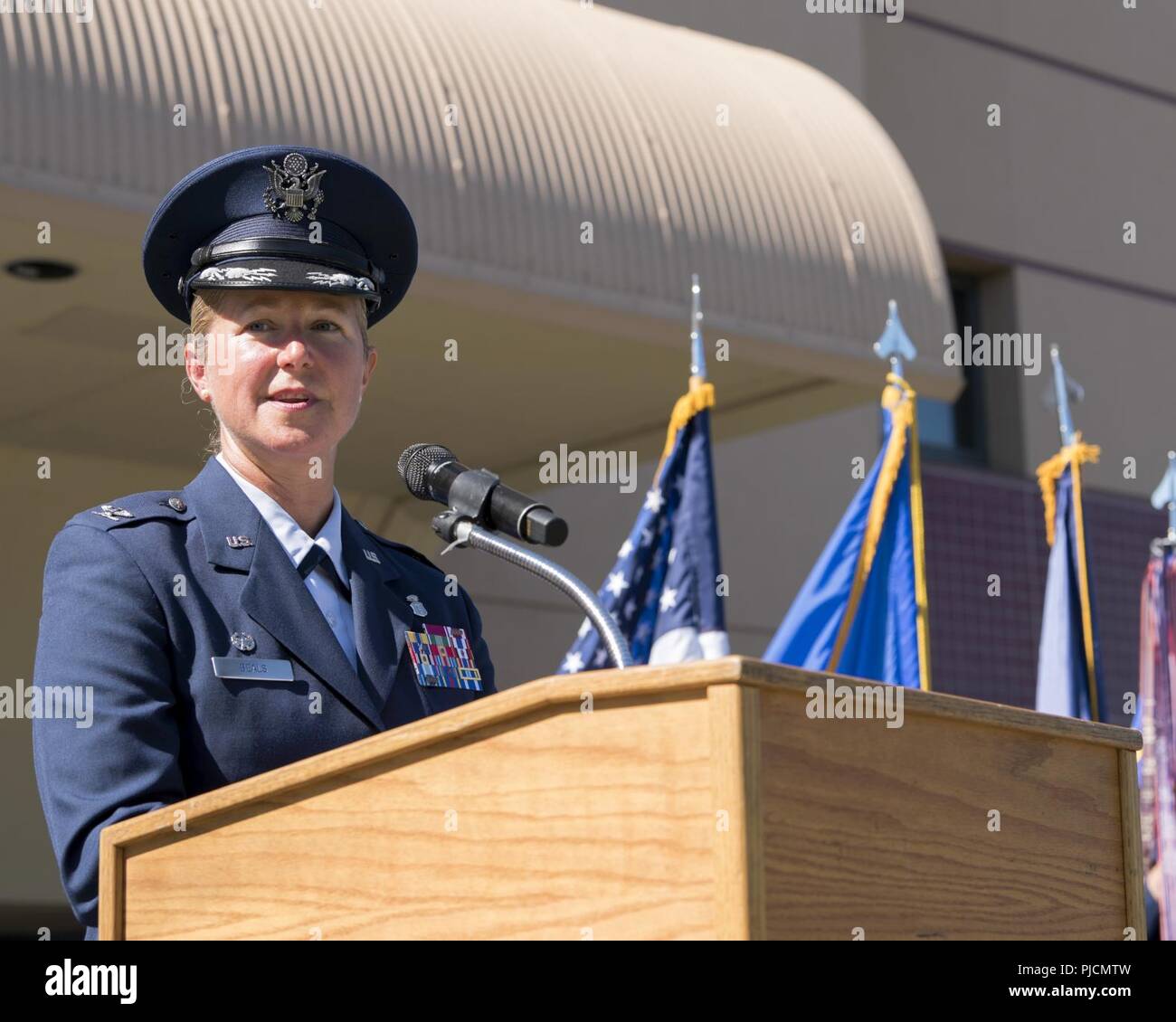 Col. Kristen Beals, 60th Medical Group commander provides remarks during the 60th MDG change of command ceremony at Travis Air Force Base, Calif., July 24, 2018. Col. Ethan Griffin, 60th Air Mobility Wing commander, was the presiding officer for the ceremony. Stock Photo