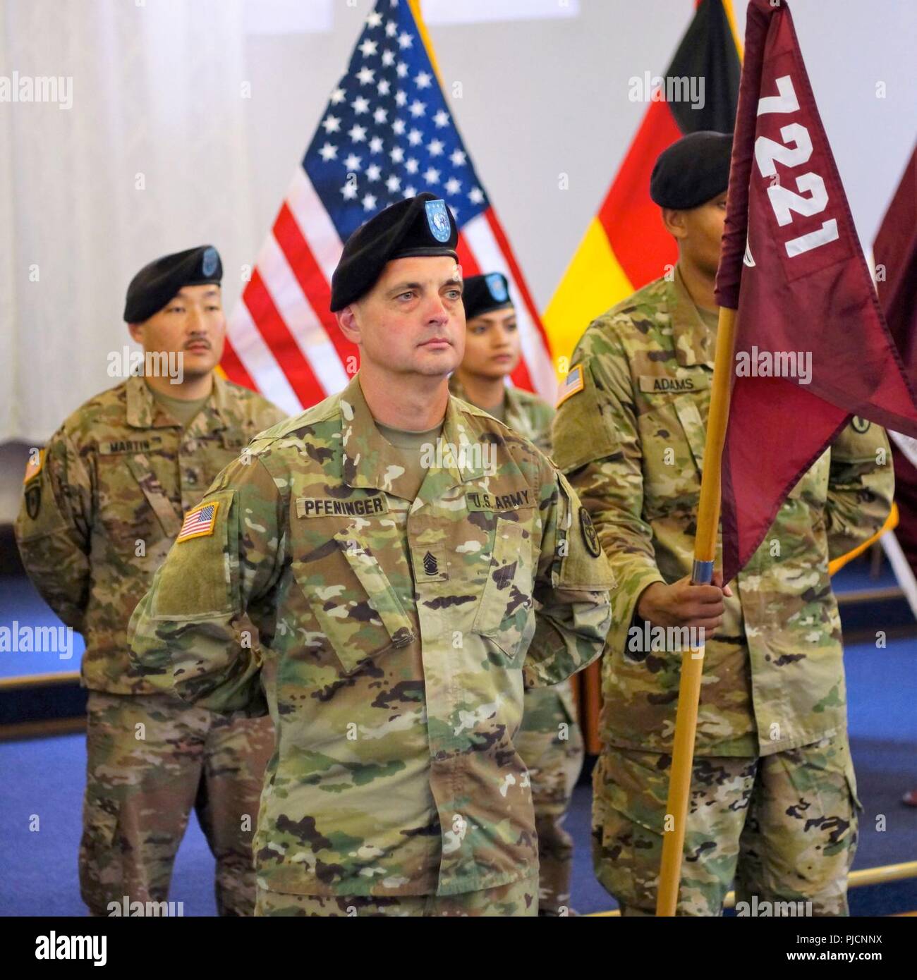 Sgt. Maj. Charles Pfeninger, assigned to the 7221st Medical Support Unit, participates in the Deployed Warrior Medical Management Center transfer of authority ceremony, conducted at the Landstuhl Regional Medical Center Chapel, Landstuhl, Germany on July 12, 2018.  The 7221st assumes command of the DWMMC from the 7217th MSU, and will be on station in Germany for one year. Stock Photo