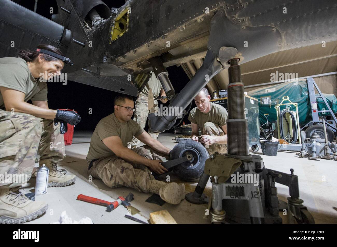 U.S. Air Force HH-60 Pavehawk maintainers assigned to the 801st ...