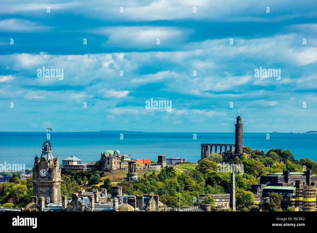 Edinburgh old city centre panoramic view of architecture from vantage point of Edinburgh Castle featuring Waverley railway station and Calton hill Stock Photo