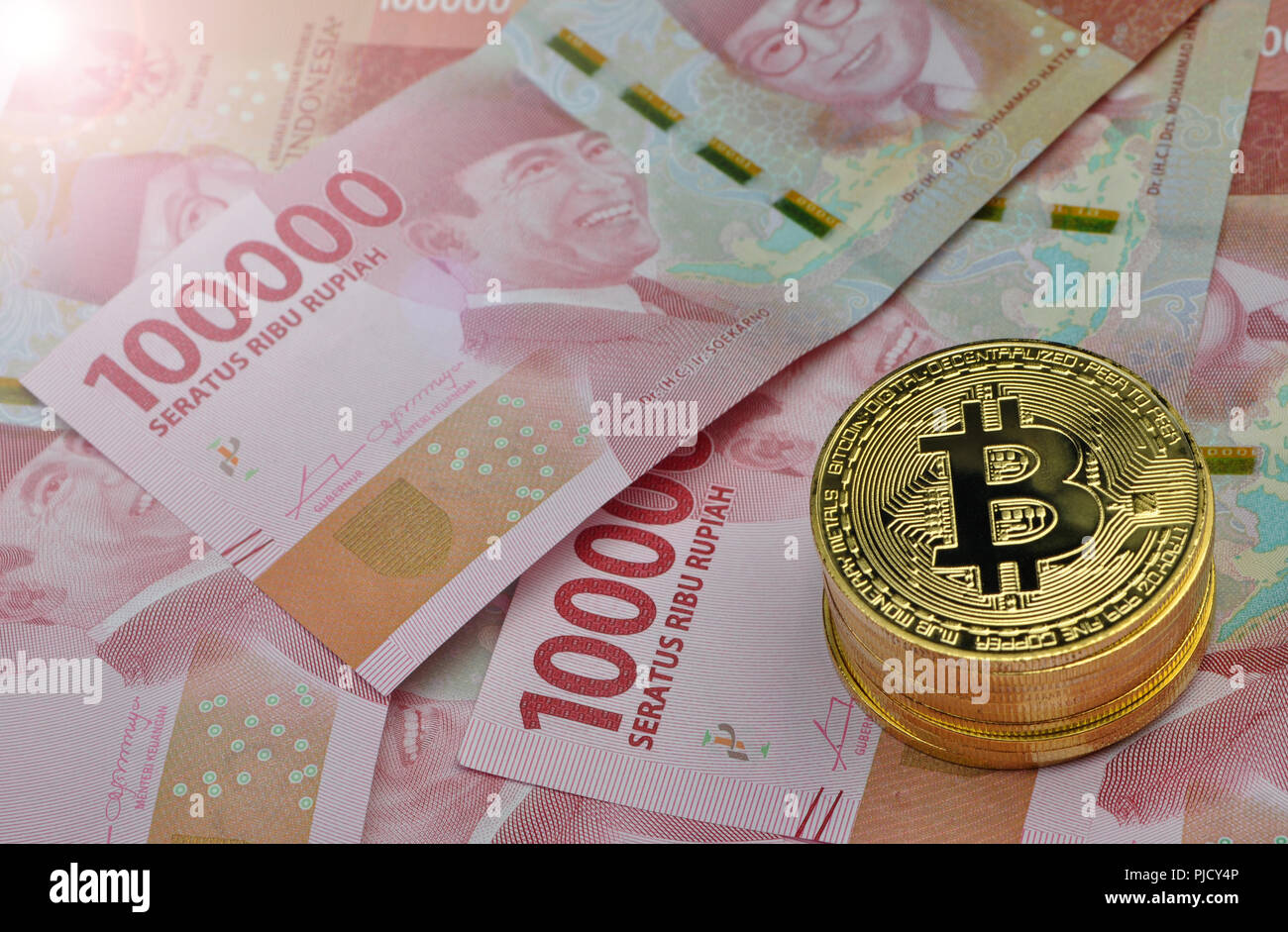 Bitcoin and Indonesia Rupiah Stock Photo - Alamy