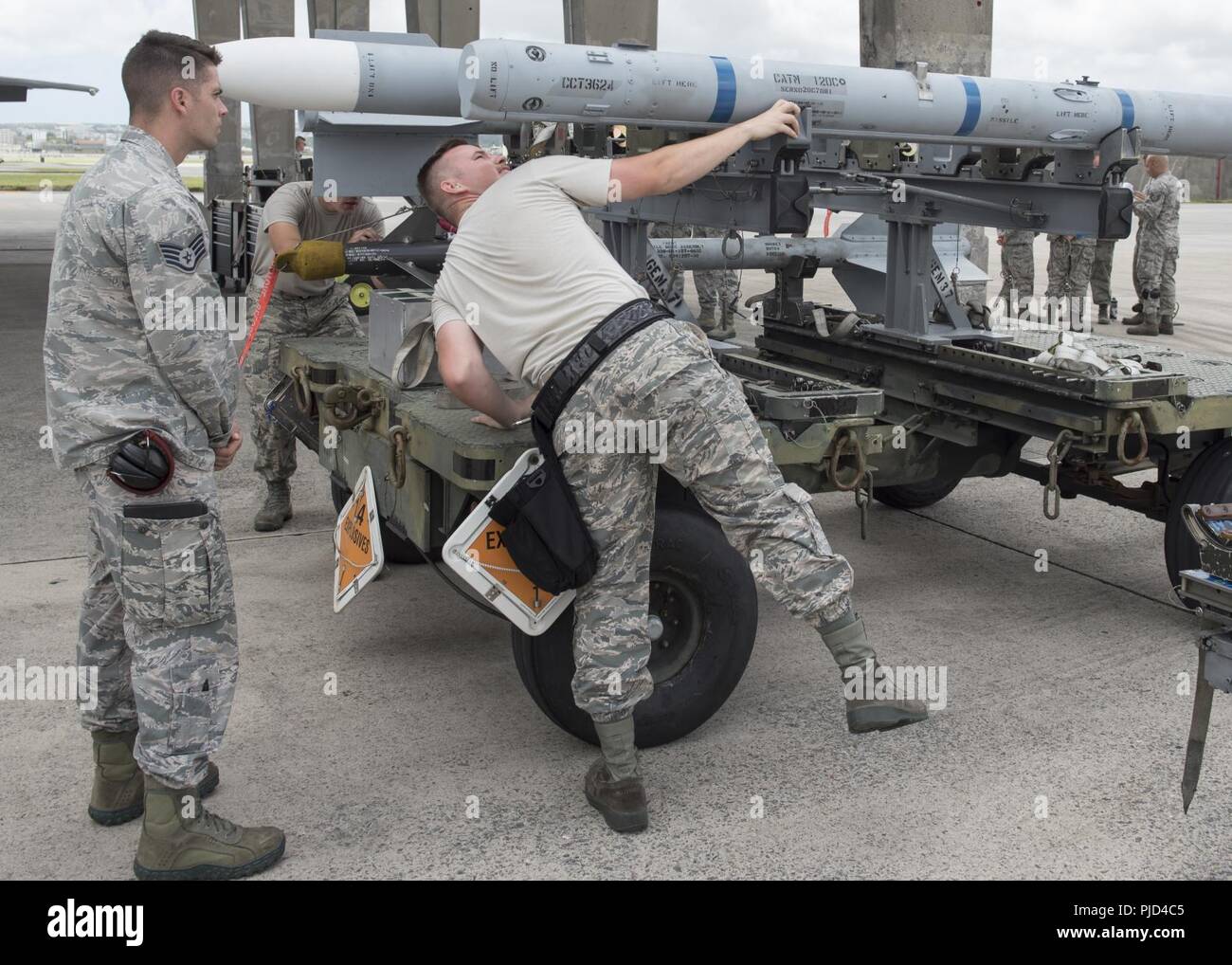 Members of the 44th Aircraft Maintenance Unit inspect ammunition during ...