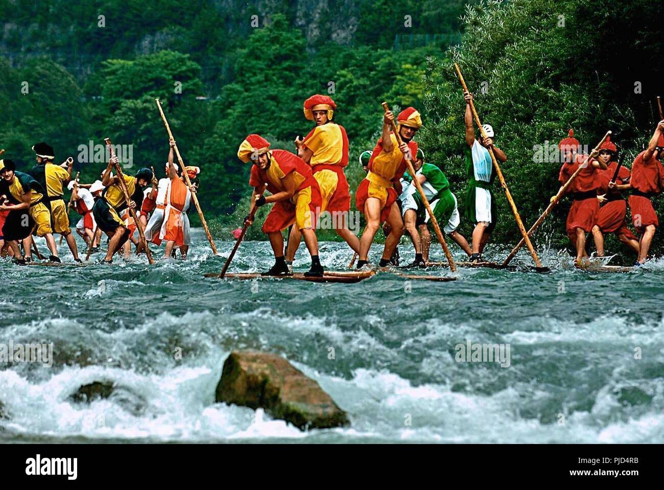 Palio delle Zattere - Raft Race,  July 22, 2-8 p.m., in Valstagna; this annual competition takes place on a panoramic stretch of the Brenta River in commemoration of the terrible flood of 1966; the parade starts at 3 p.m., the raft race at 5 p.m.; entertainment with flag-throwers, live Venetian folk music and traditional trade exhibit in Piazza San Marco; food booths feature fried trout and other specialties; free entrance. Stock Photo