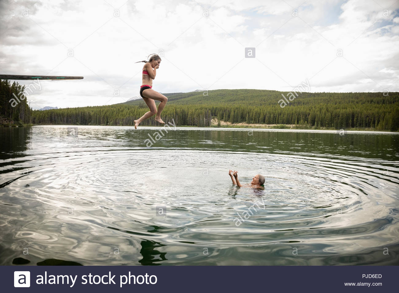 Two Jumping Woman Hi res Stock Photography And Images Alamy