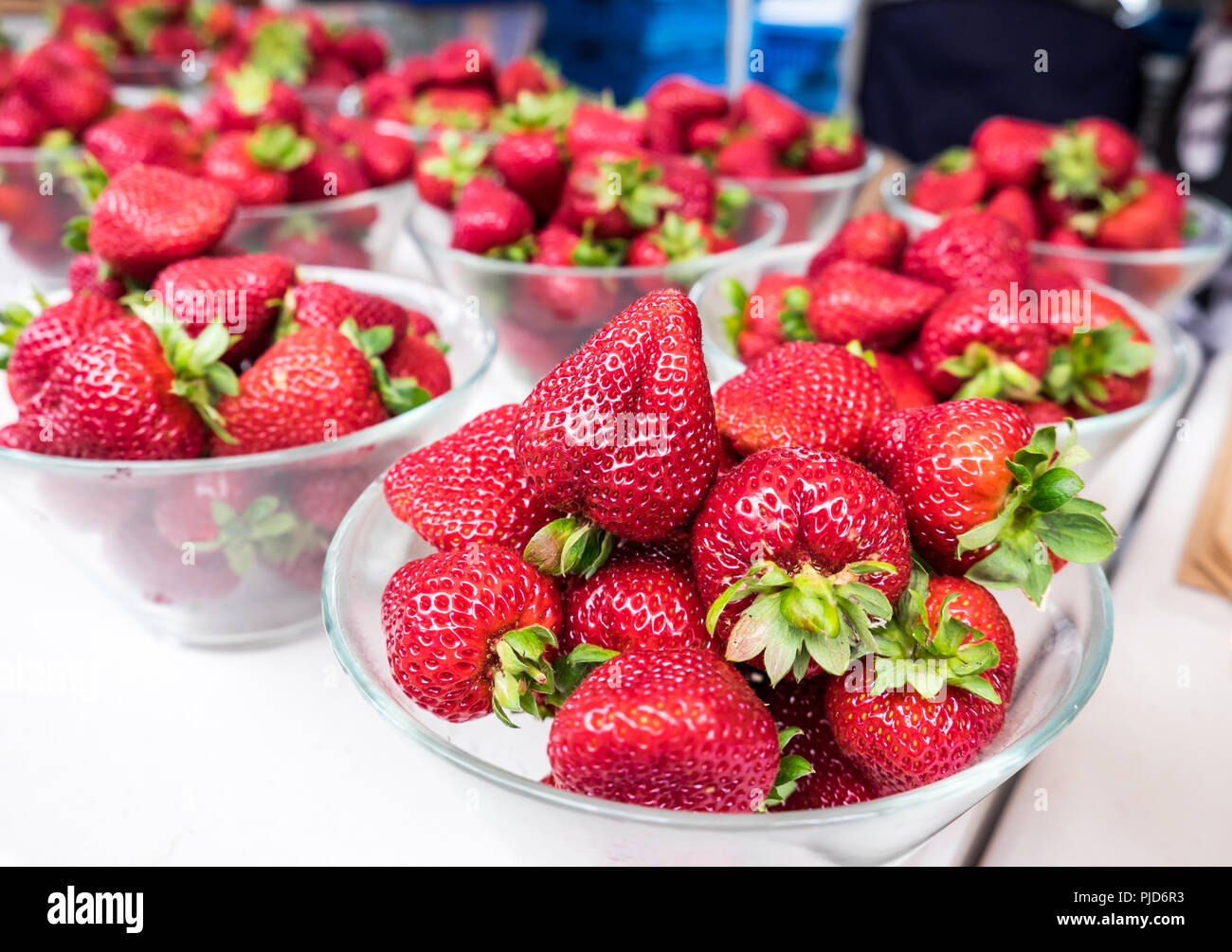 Fresh strawberries on display at a farmers market in New Zealand, NZ