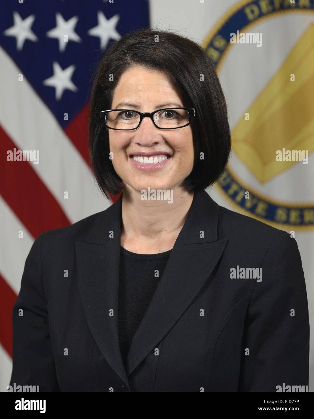 Michele Pearce, Deputy General Counsel (Legislation) poses for her