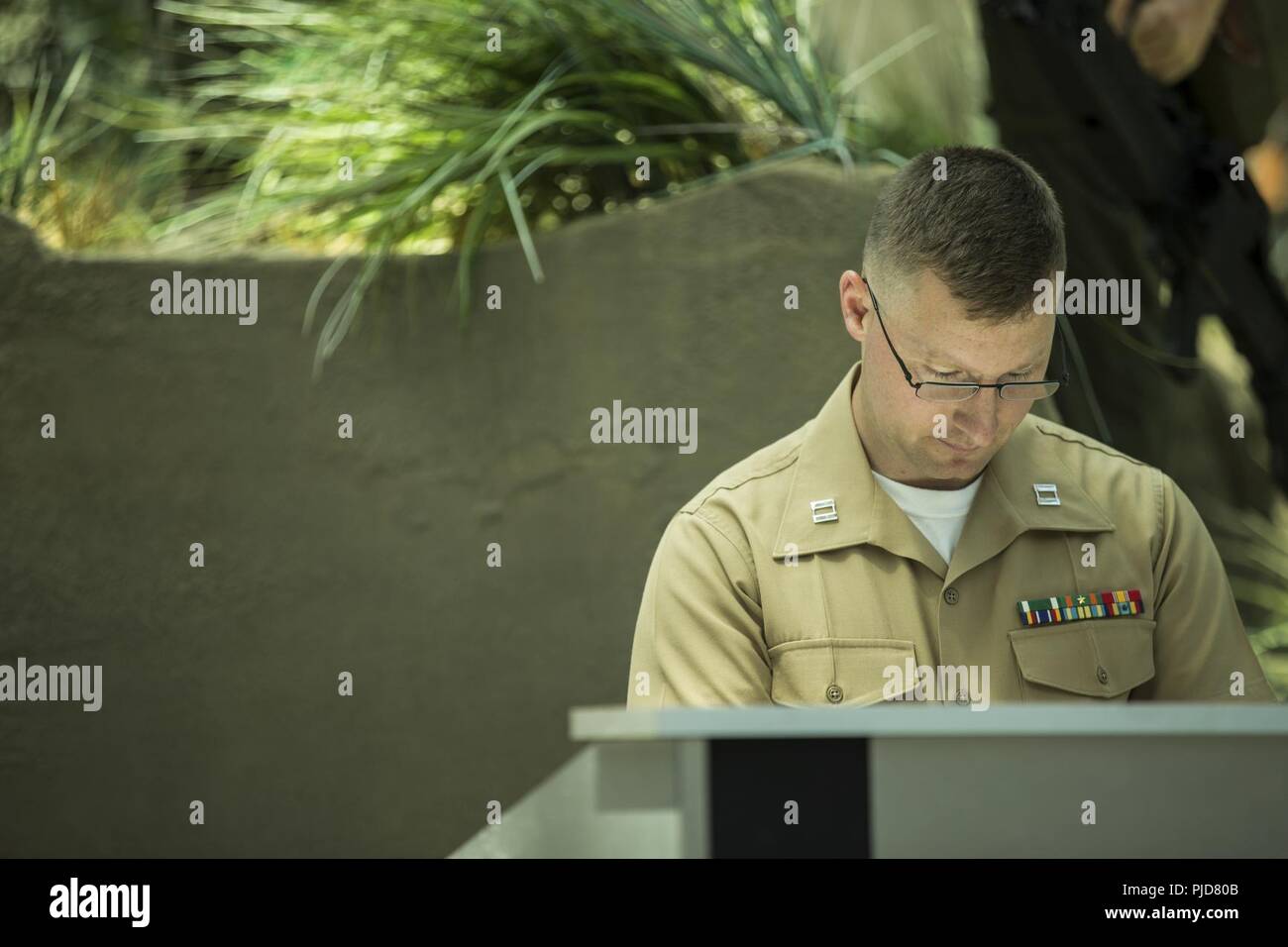 U.S. Marine Corps Master Sgt. Fernando Torres, division chief, Aviation Support and Logistics Department (ASLD), is retired by Col. Russell A. Blauw deputy branch head, ASLD, at the National Museum of the Marine Corps, Triangle, Va, July 20, 2018. Torres served an honorable 22 years in the military. Stock Photo