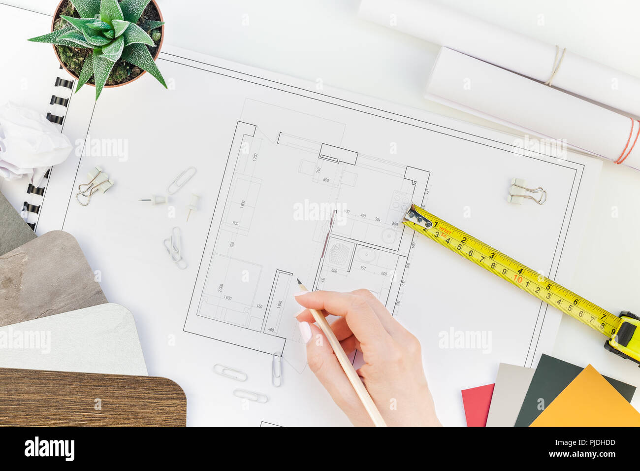 Creative flat lay overhead top view blueprints architectural flat project plan and office