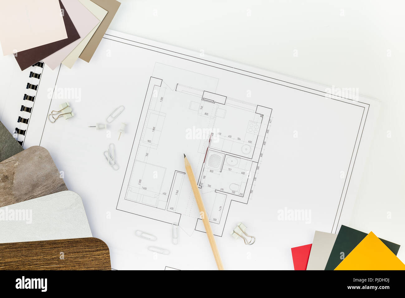 Creative flat lay overhead top view blueprints architectural flat project plan and office