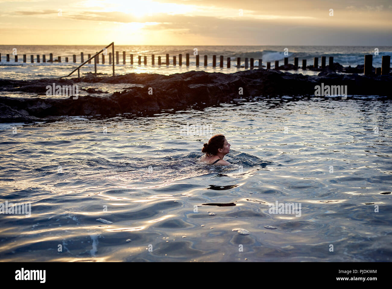 Mature woman swimming pool hi-res stock photography and images - Alamy
