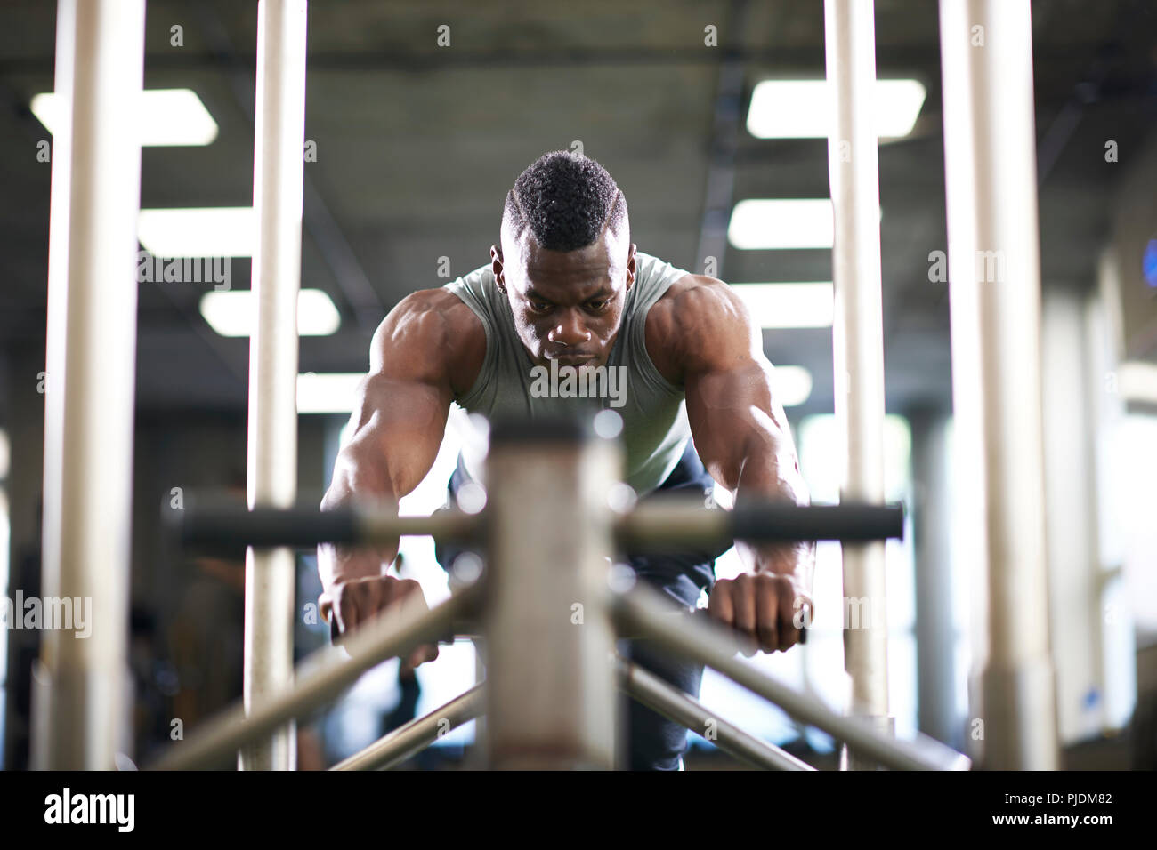 Man doing sled training in gym Stock Photo