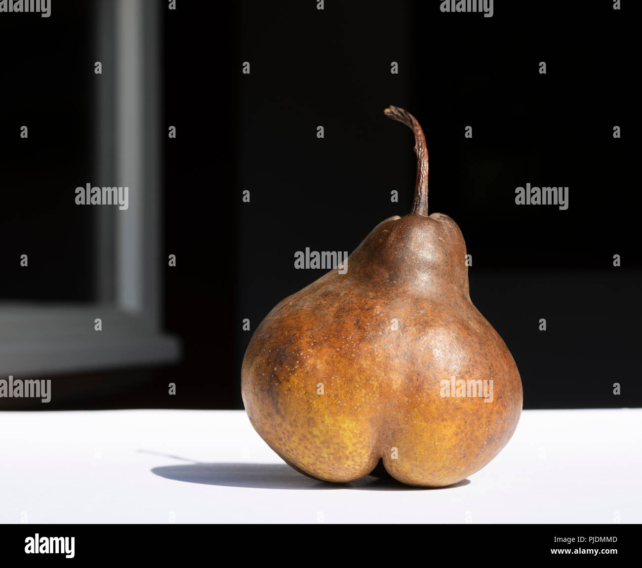 Pear in morning sun Stock Photo