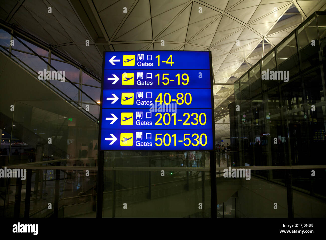 departure gate direction board terminal 1 hong kong international airport chek lap kok hong kong china Stock Photo