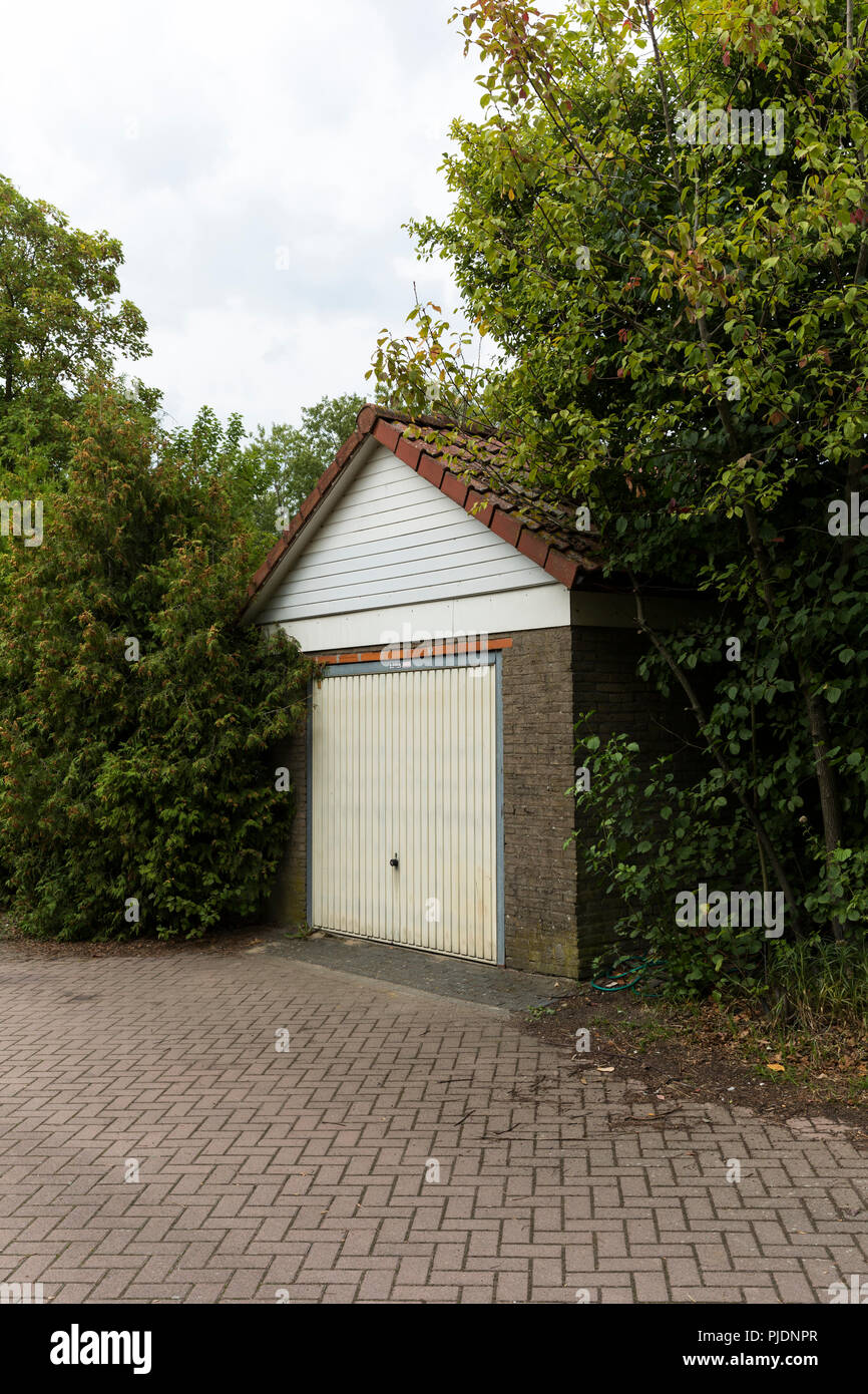 Home Single Car Garage Between Bushes Stock Photo 217890703 Alamy