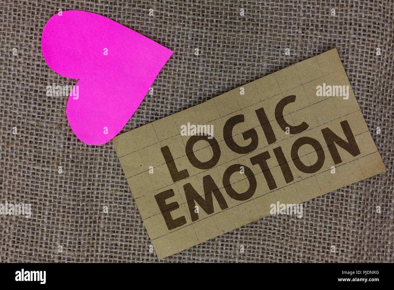 Word writing text Logic Emotion. Business concept for Unpleasant Feelings turned to Self Respect Reasonable Mind Piece squared paperboard paper heart  Stock Photo