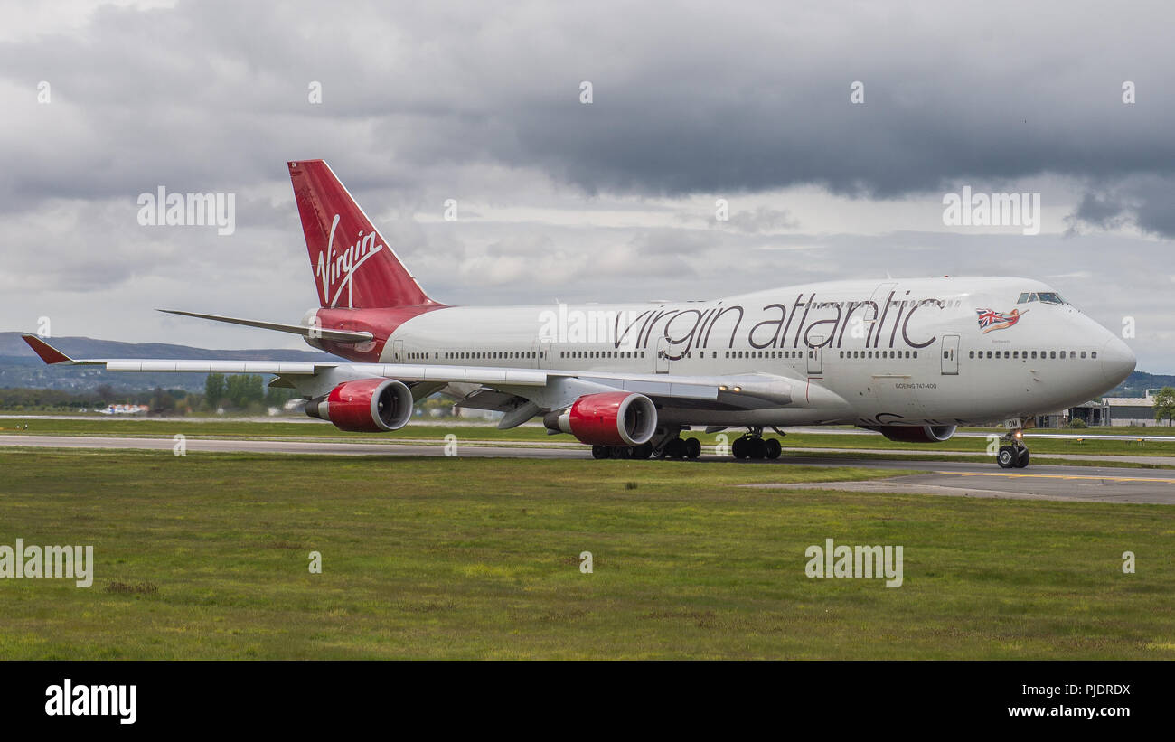 Virgin Atlantic Jumbo Jet (Boeing 747-400) seen departing for Florida from Glasgow International Airport, Renfrewshire, Scotland. Stock Photo