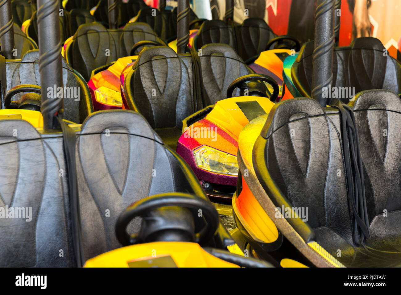 Bumper car seats empty ready to use Stock Photo Alamy