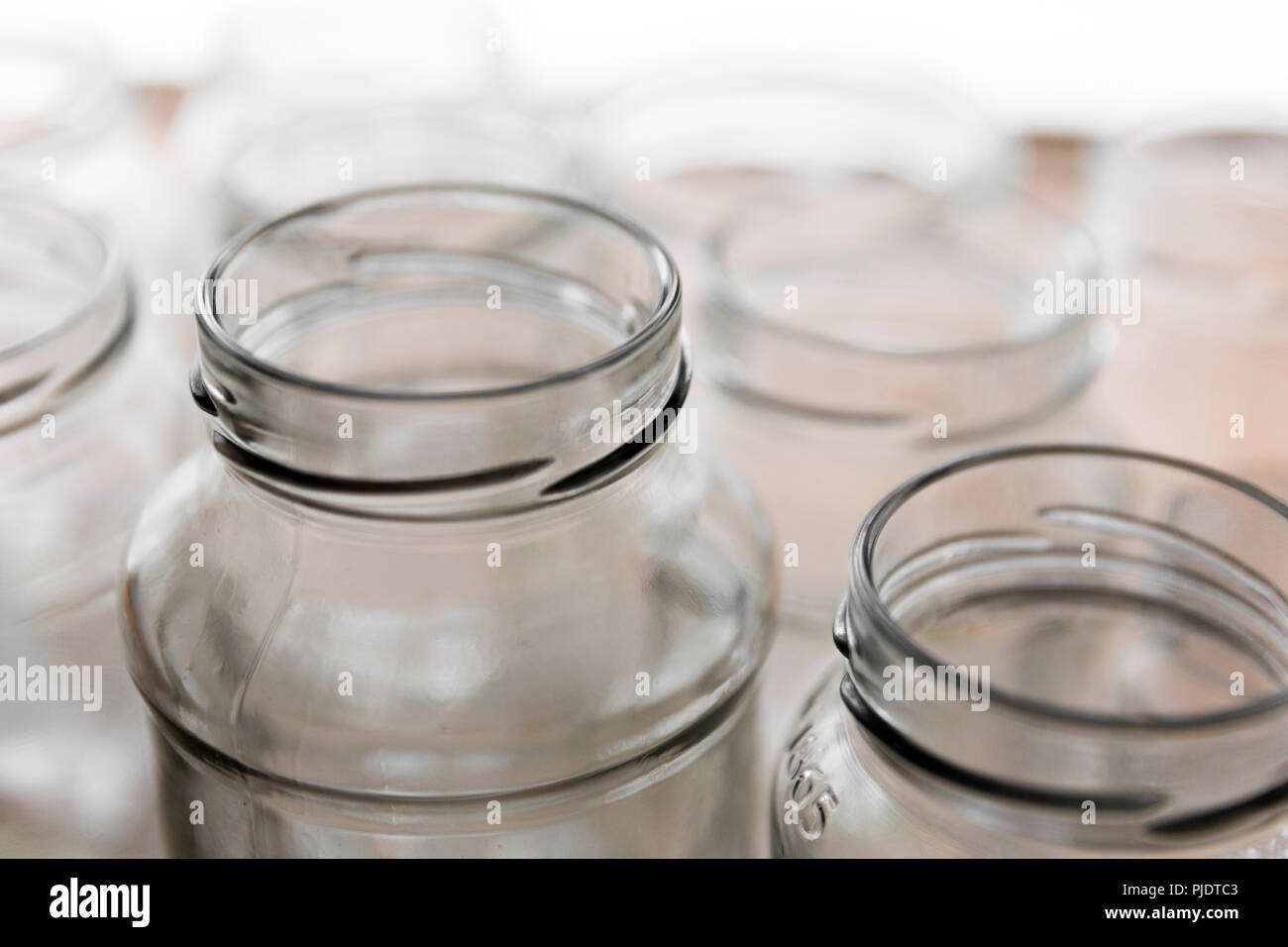 Clean glass jars collected together ready for recycling Stock Photo Alamy