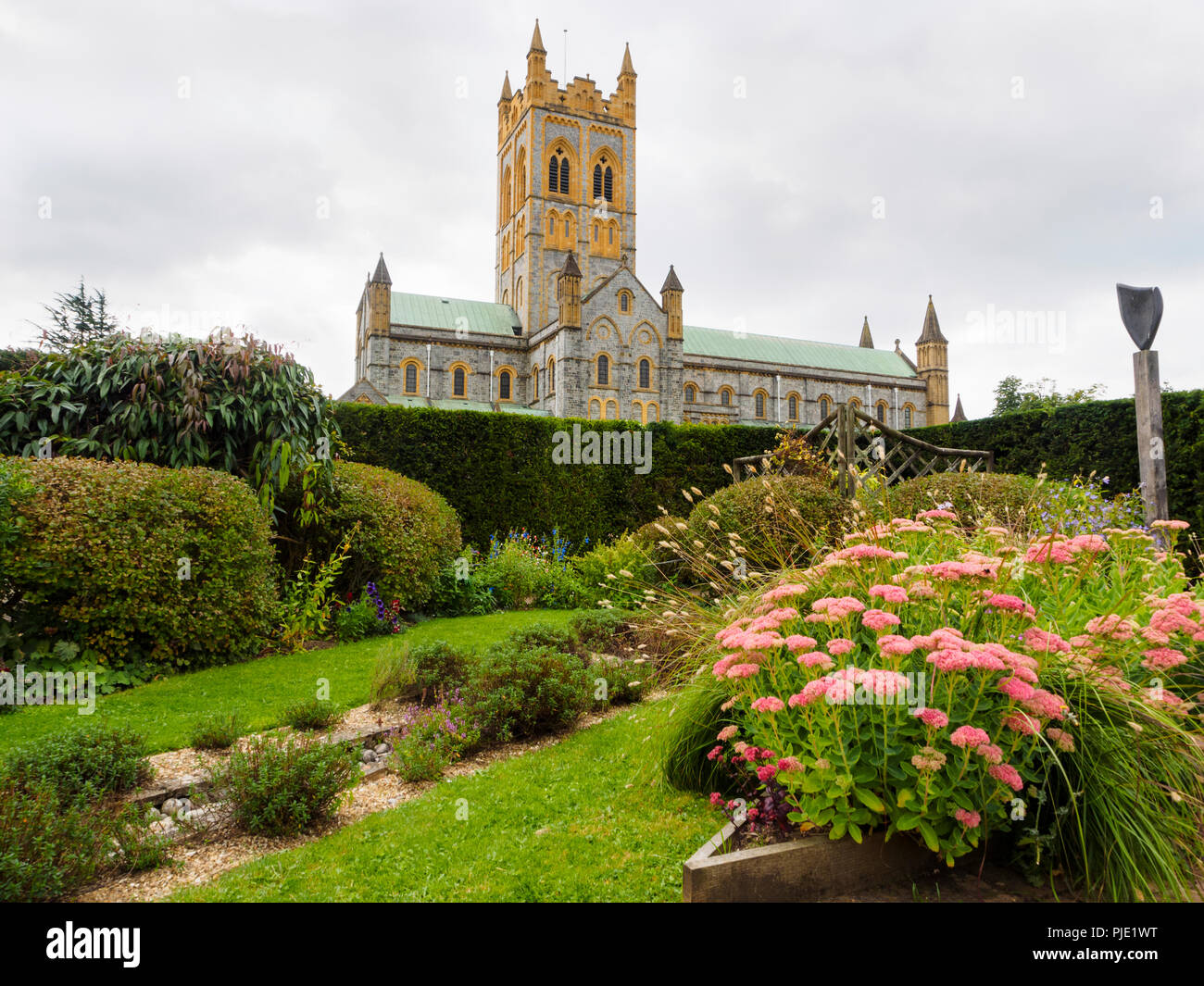 Benedictine Buckfast Abbey Church side view from the Sensory Garden Stock Photo