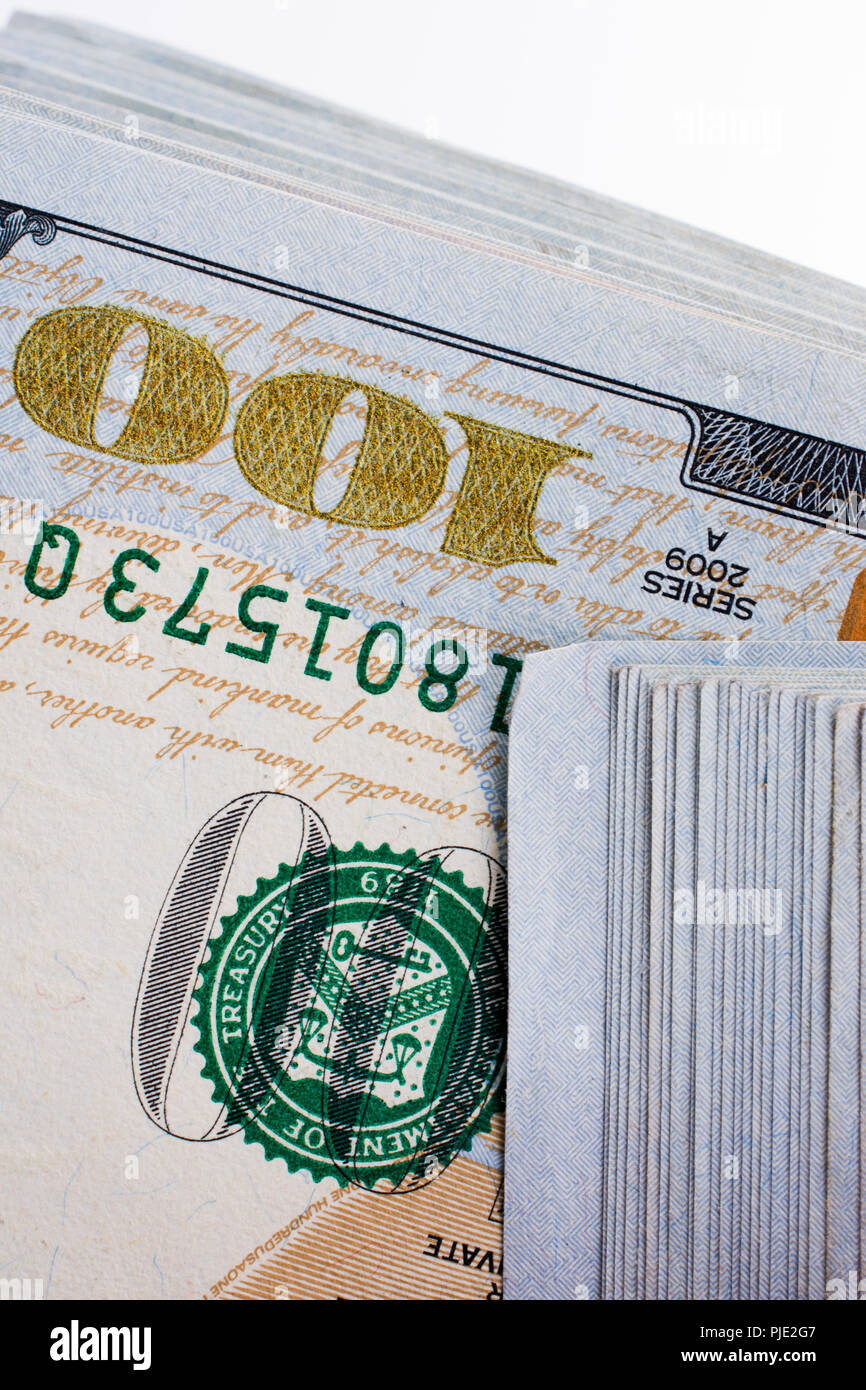 American 100 dollar banknotes made of paper placed on white background ...