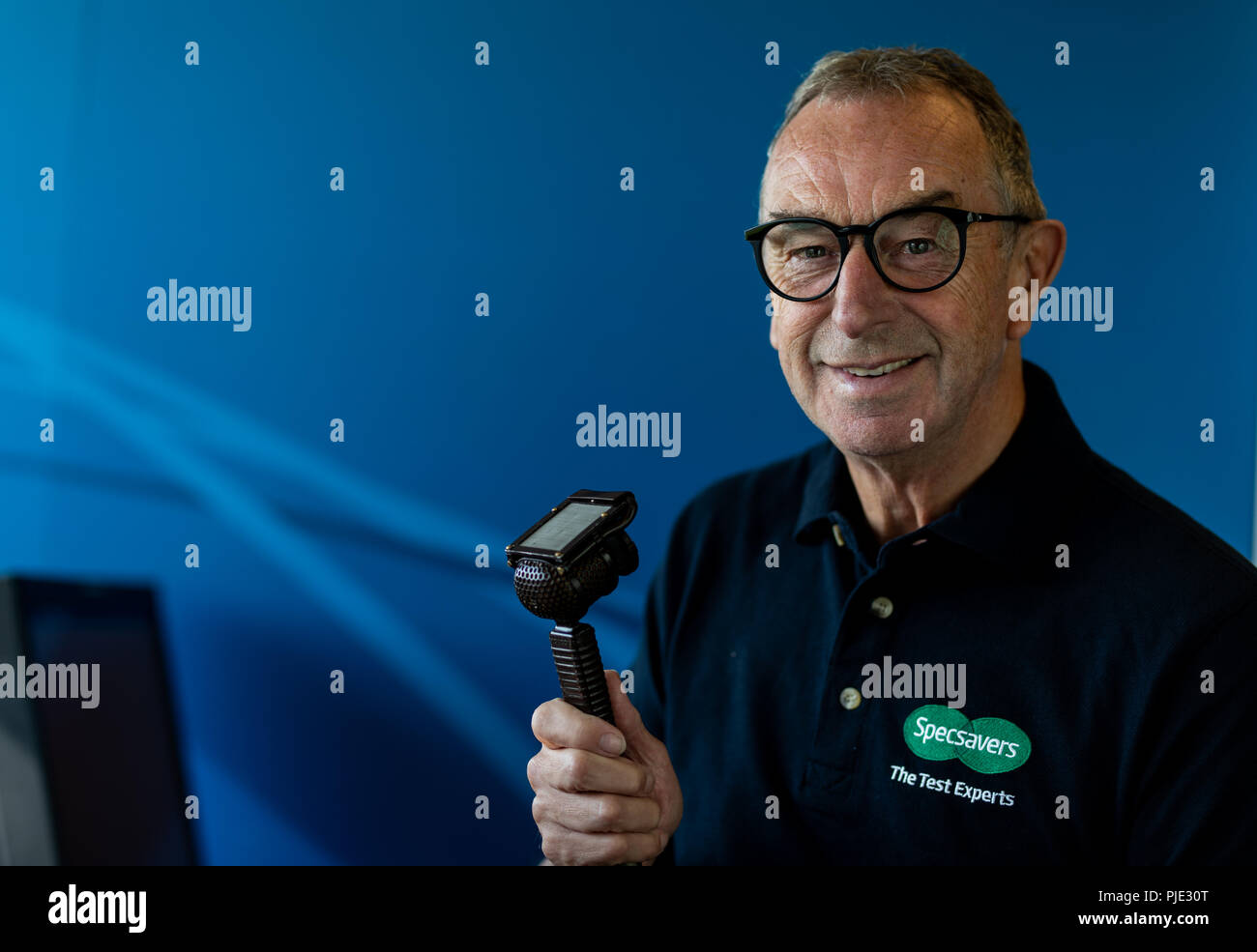 David 'Bumble' Lloyd poses for a photographer during a Specsavers event at the Kia Oval, London. Stock Photo