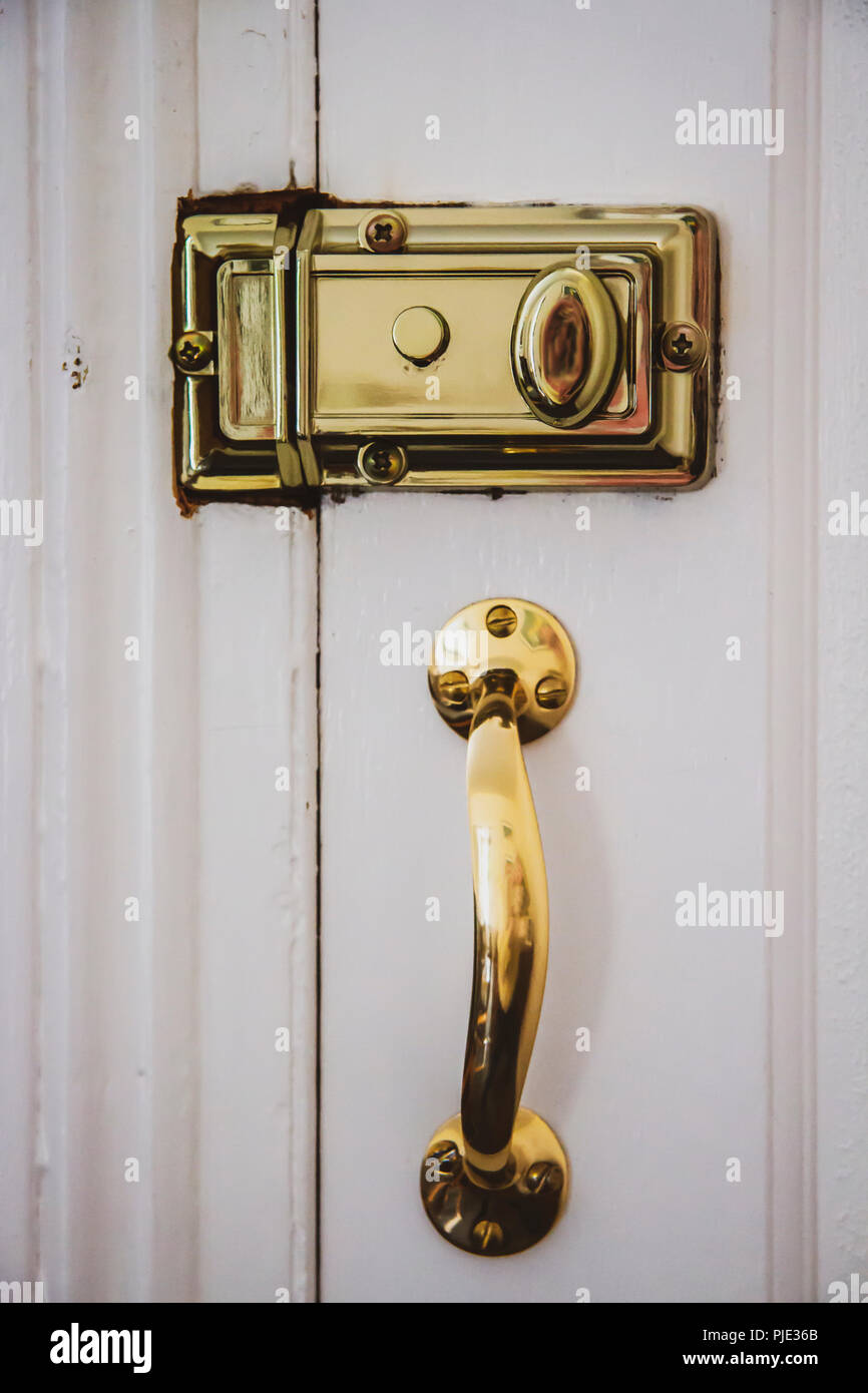 Brass door lock and handle Stock Photo