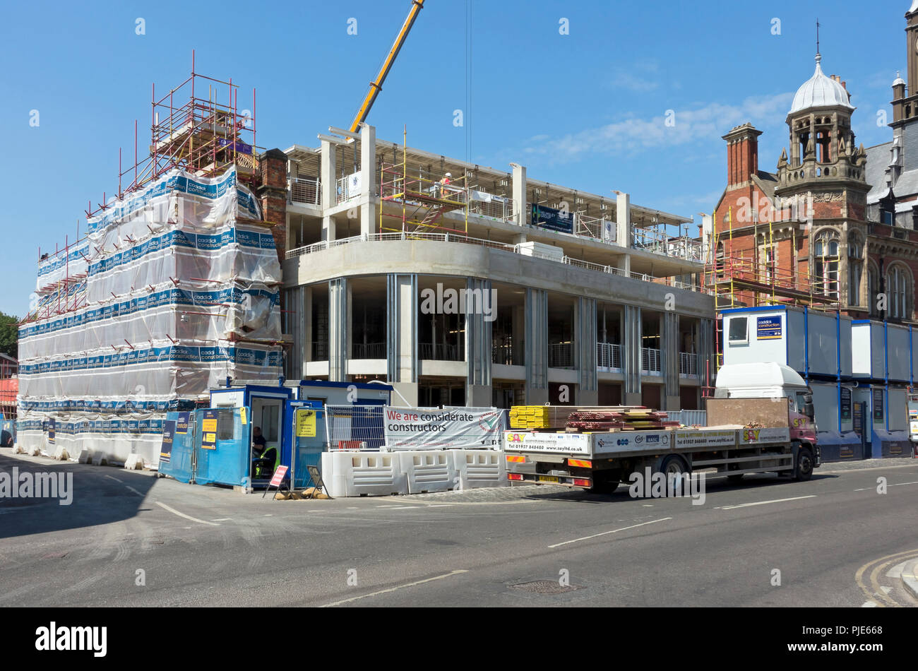 Construction apartment flats building site in the city town centre in summer York North Yorkshire England UK United Kingdom GB Great Britain Stock Photo