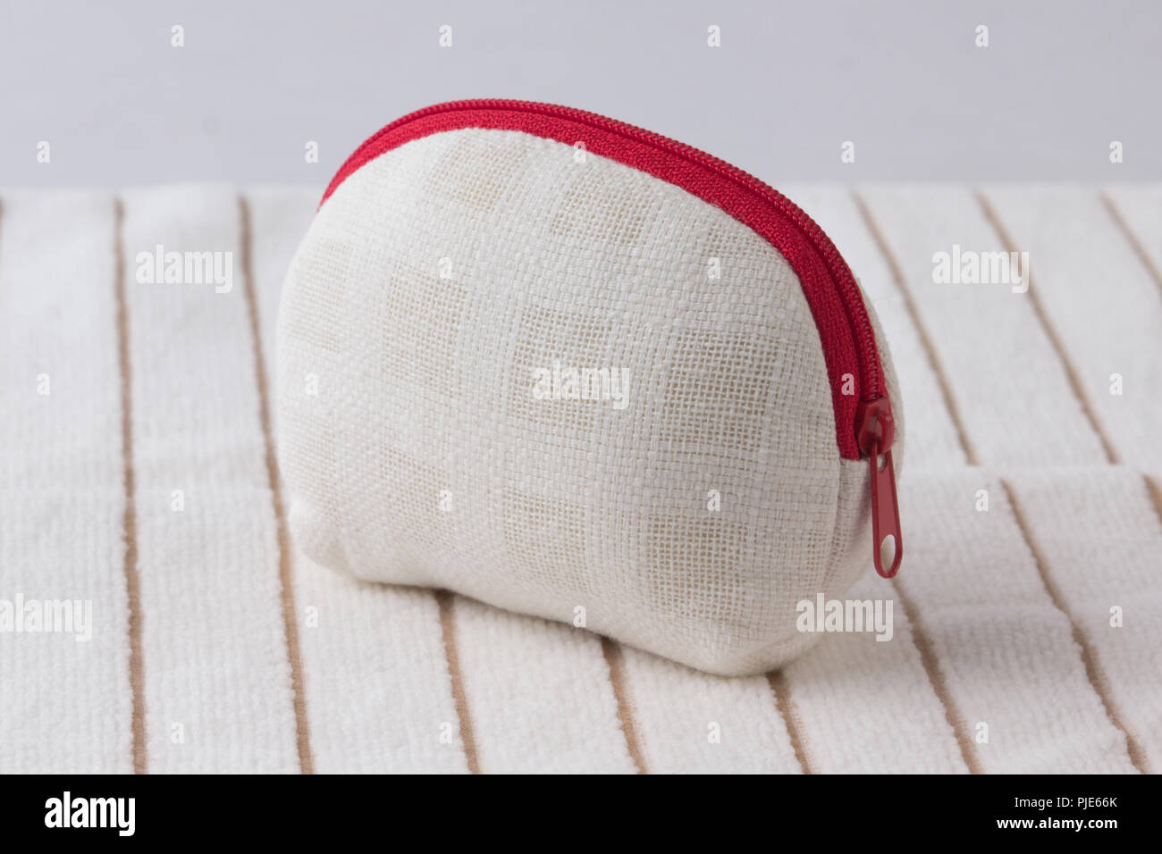handmade fabric coins purse on white cloth background Stock Photo