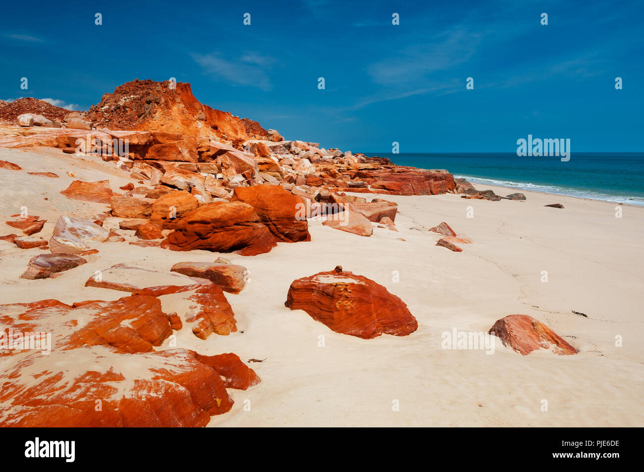 Typical red rocky cliffs at Cape Leveque. Stock Photo