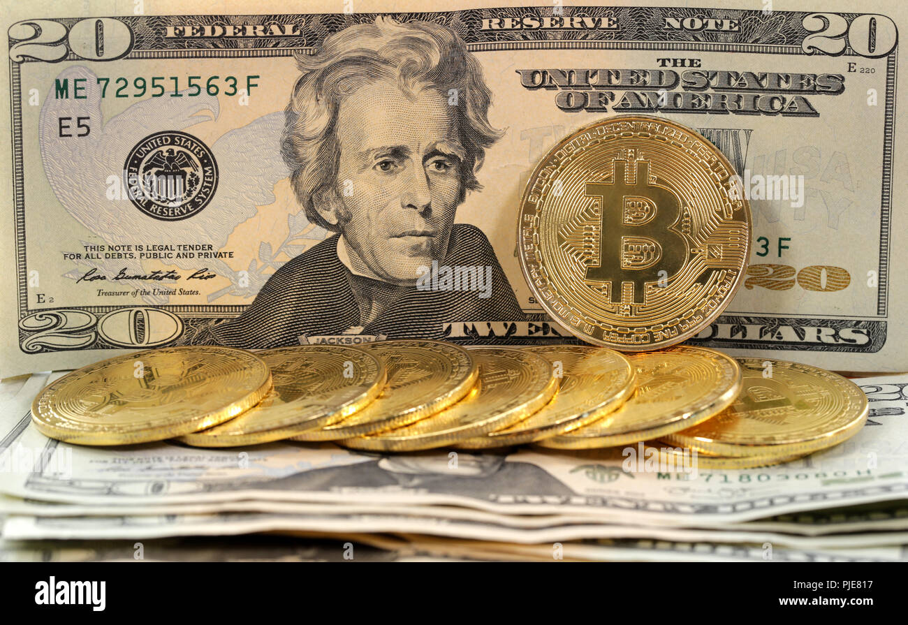 Virtual cryptocurrency money Bitcoin golden coins on United States US  twenty dollar bill ($20) with the faces of President Andrew Jackson Stock  Photo - Alamy