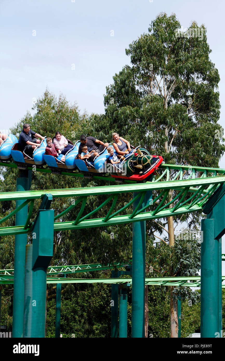 Holidaymakers having fun on the roller coaster at the Big Sheep