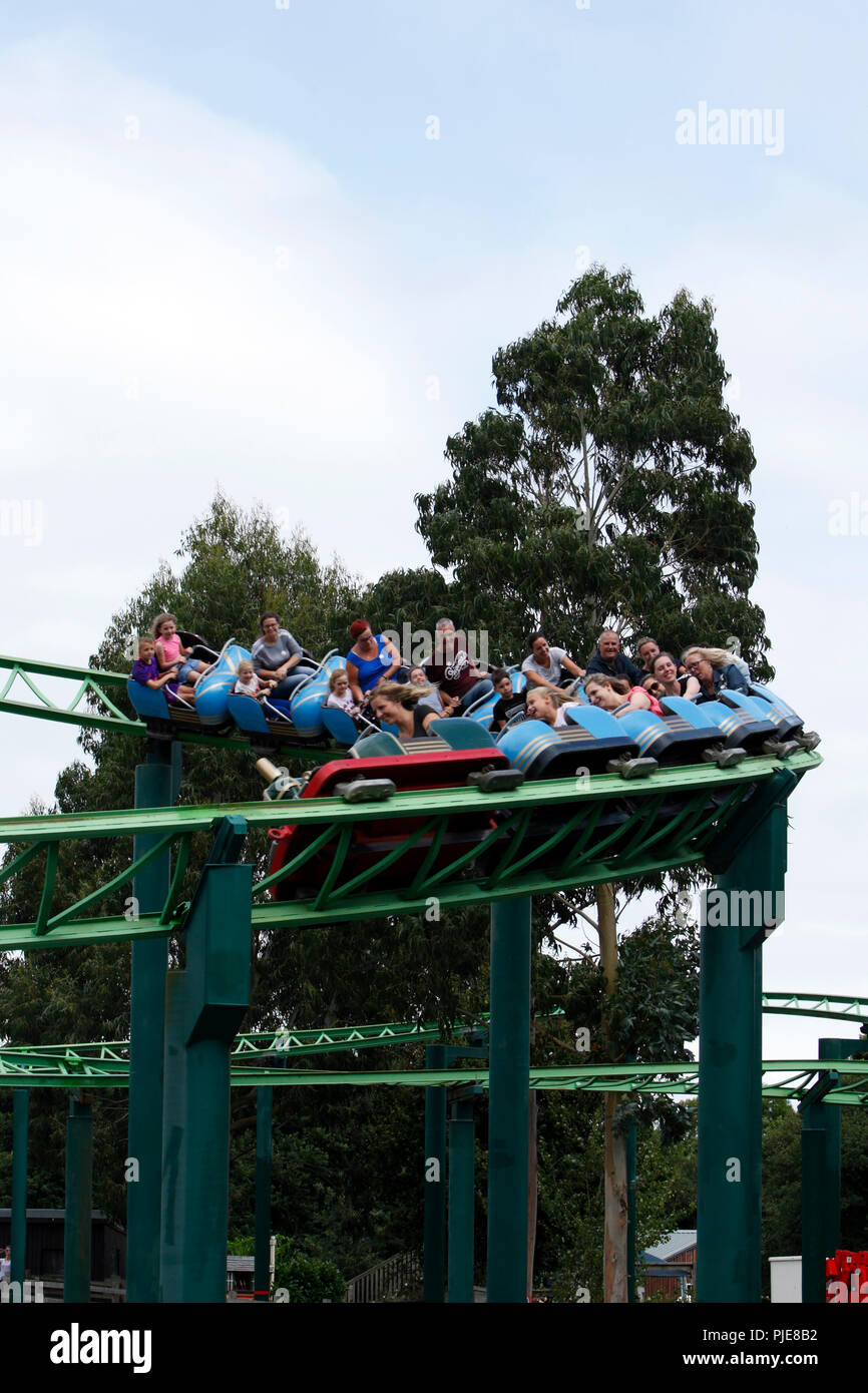 Holidaymakers having fun on the roller coaster at the Big Sheep, North Devon, Stock Photo