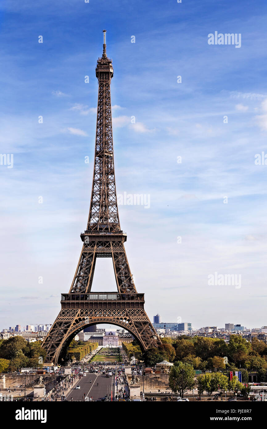 Portrait of the iconic Eiffel Tower in Paris against a blue sky. Stock Photo