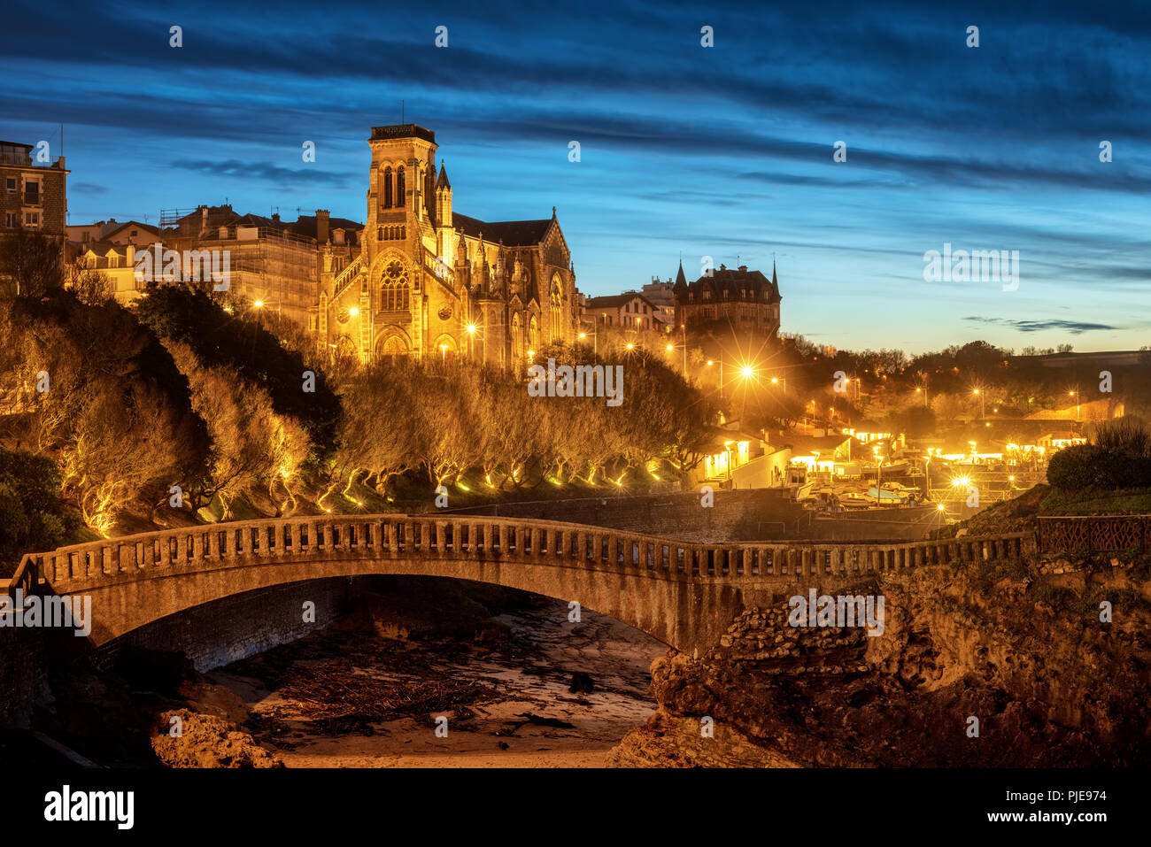 Biarritz, view of St Eugenia Church and Old Port at late evening light, Basque country, France Stock Photo