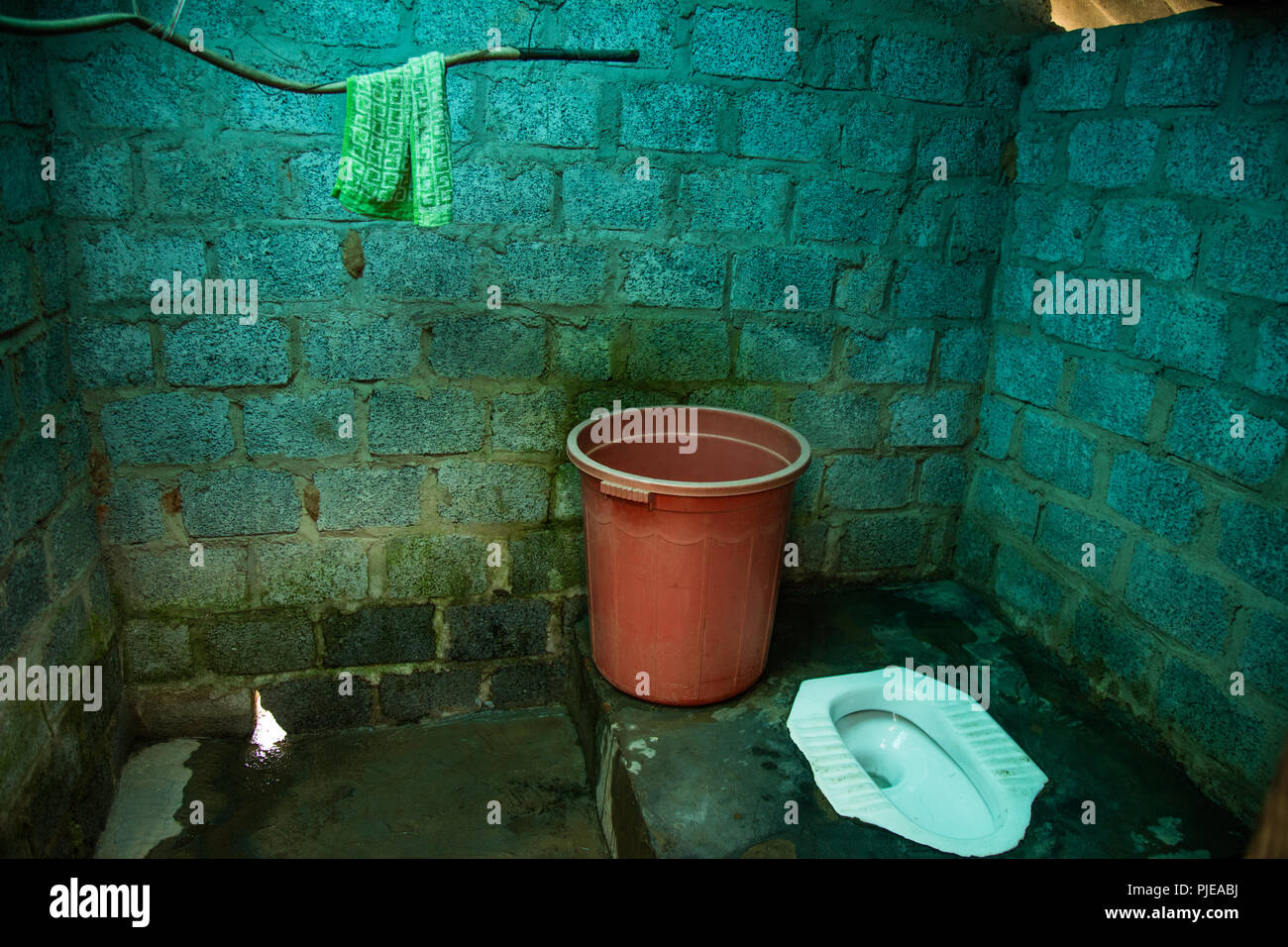 Bathroom/outhouse/latrine in more affluent cabin in rural Sapa, Vietnam Stock Photo