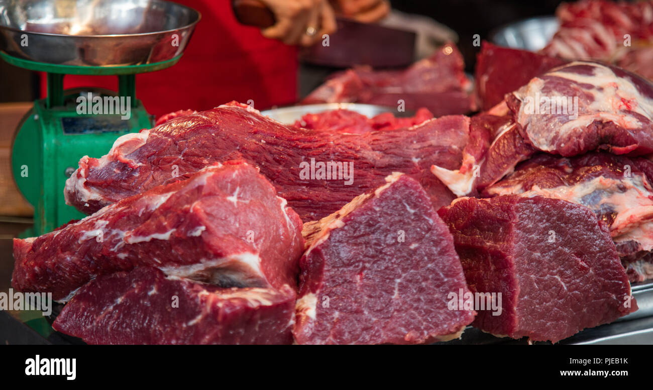 Slabs of beef at the butcher's stall in the market in Hanoi, Vietnam Stock Photo